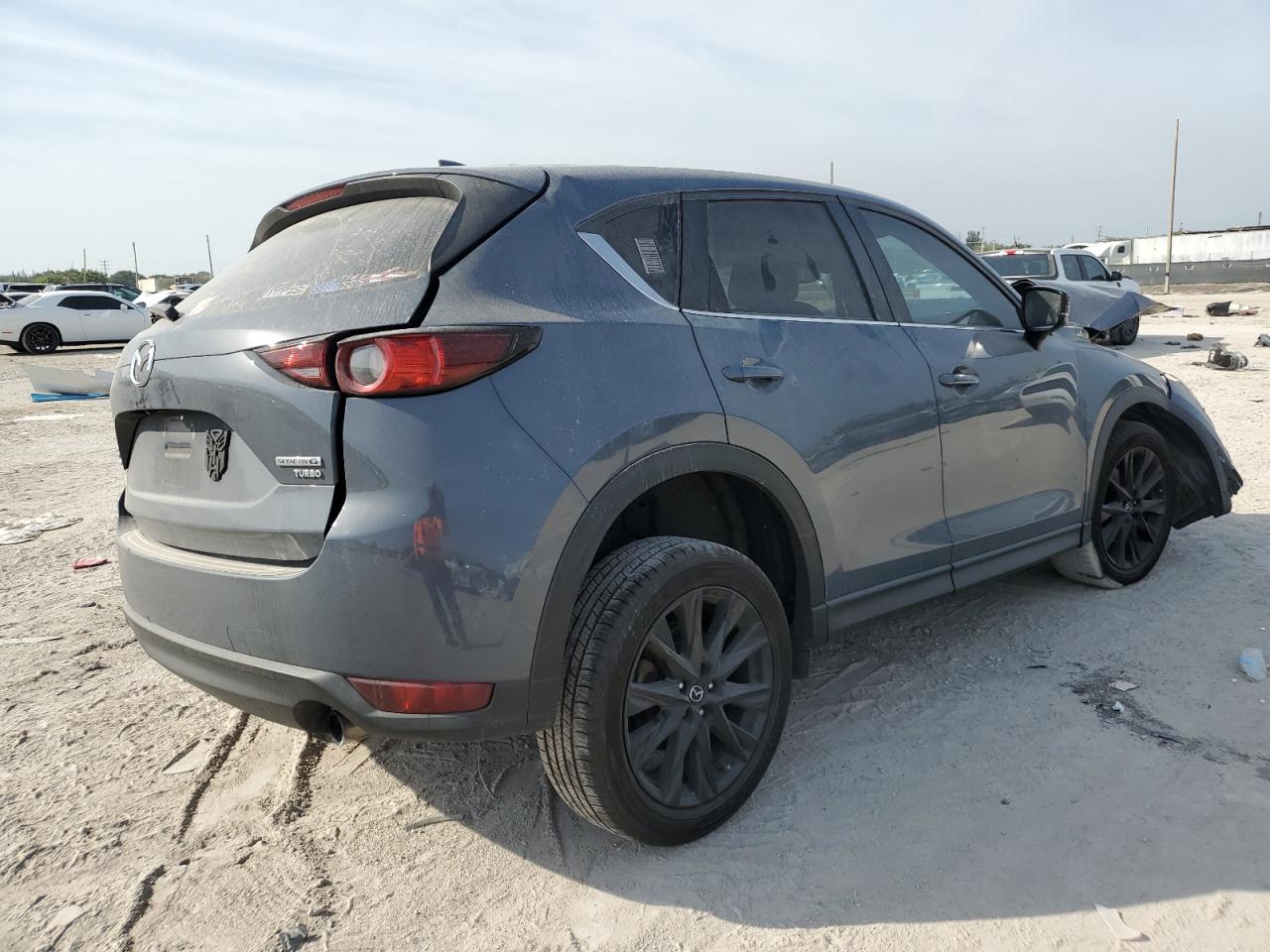 2021 Mazda CX-5 VIN JM3KFBCY3M0498065 Copart auction photo, front end / side damage thumbnail 3