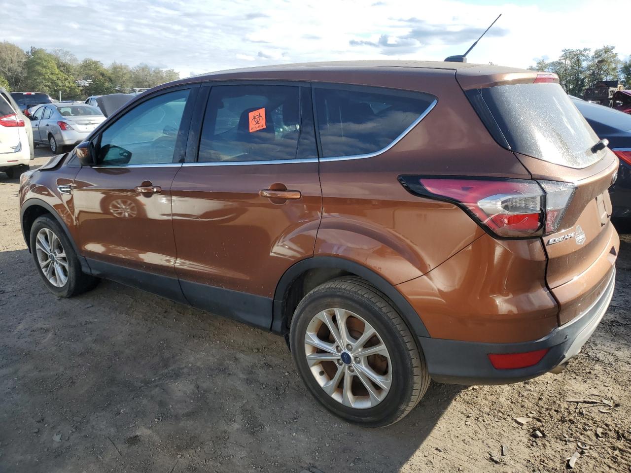 2017 Ford Escape VIN 1FMCU9GD5HUB74502 Copart auction photo, front end / minor dent/scratches damage thumbnail 2