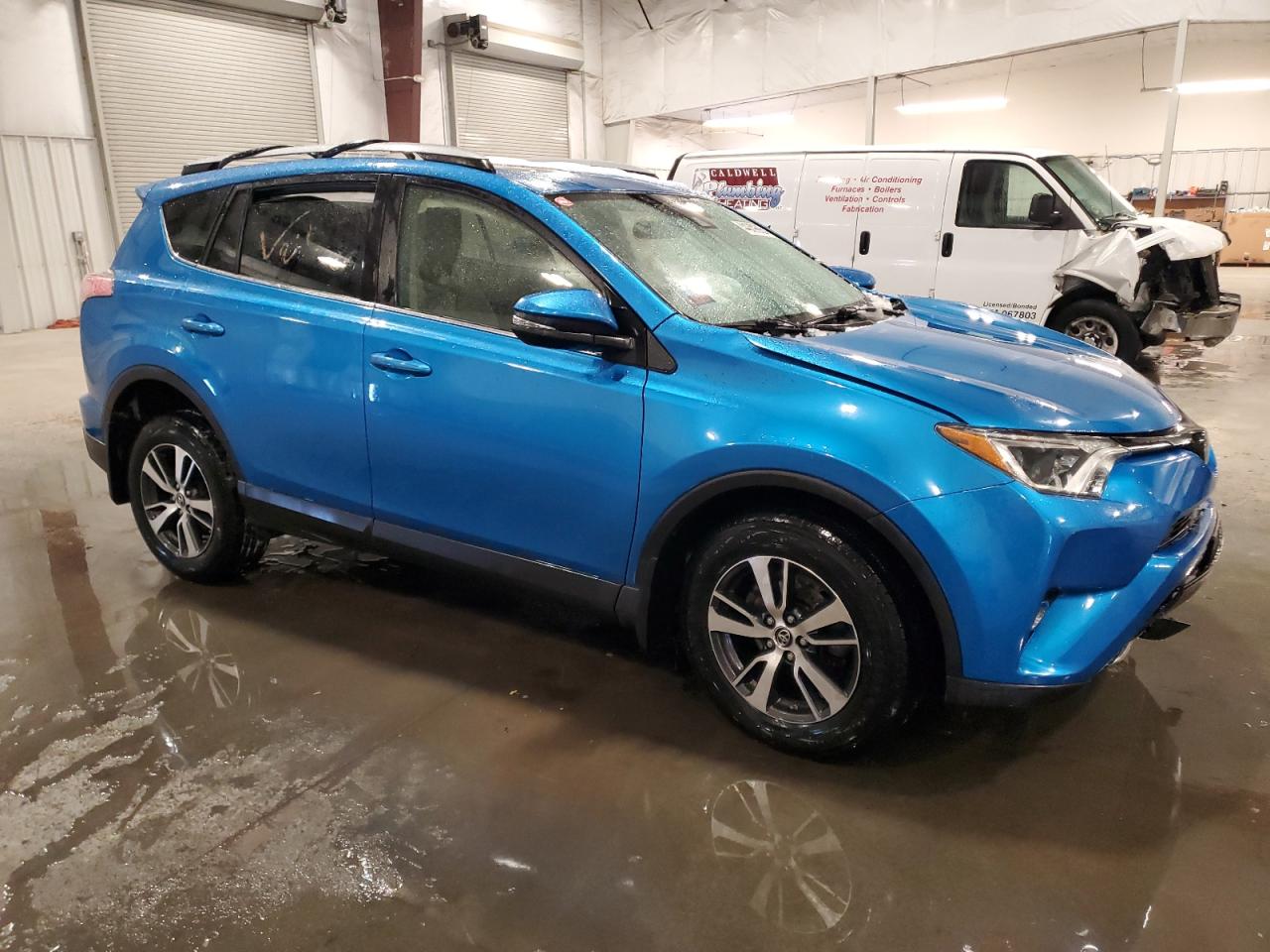 2018 Toyota RAV 4 VIN JTMRFREV3JJ748218 Copart auction photo, front end damage thumbnail 4