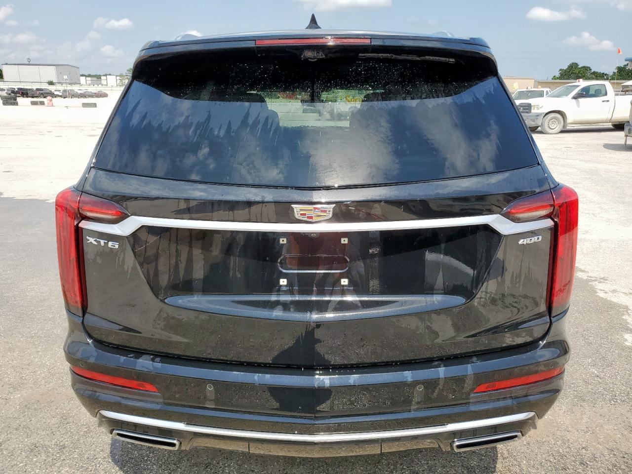 2020 Cadillac XT6 VIN 1GYKPCRSXLZ104502 Copart auction photo, front end / side damage thumbnail 6