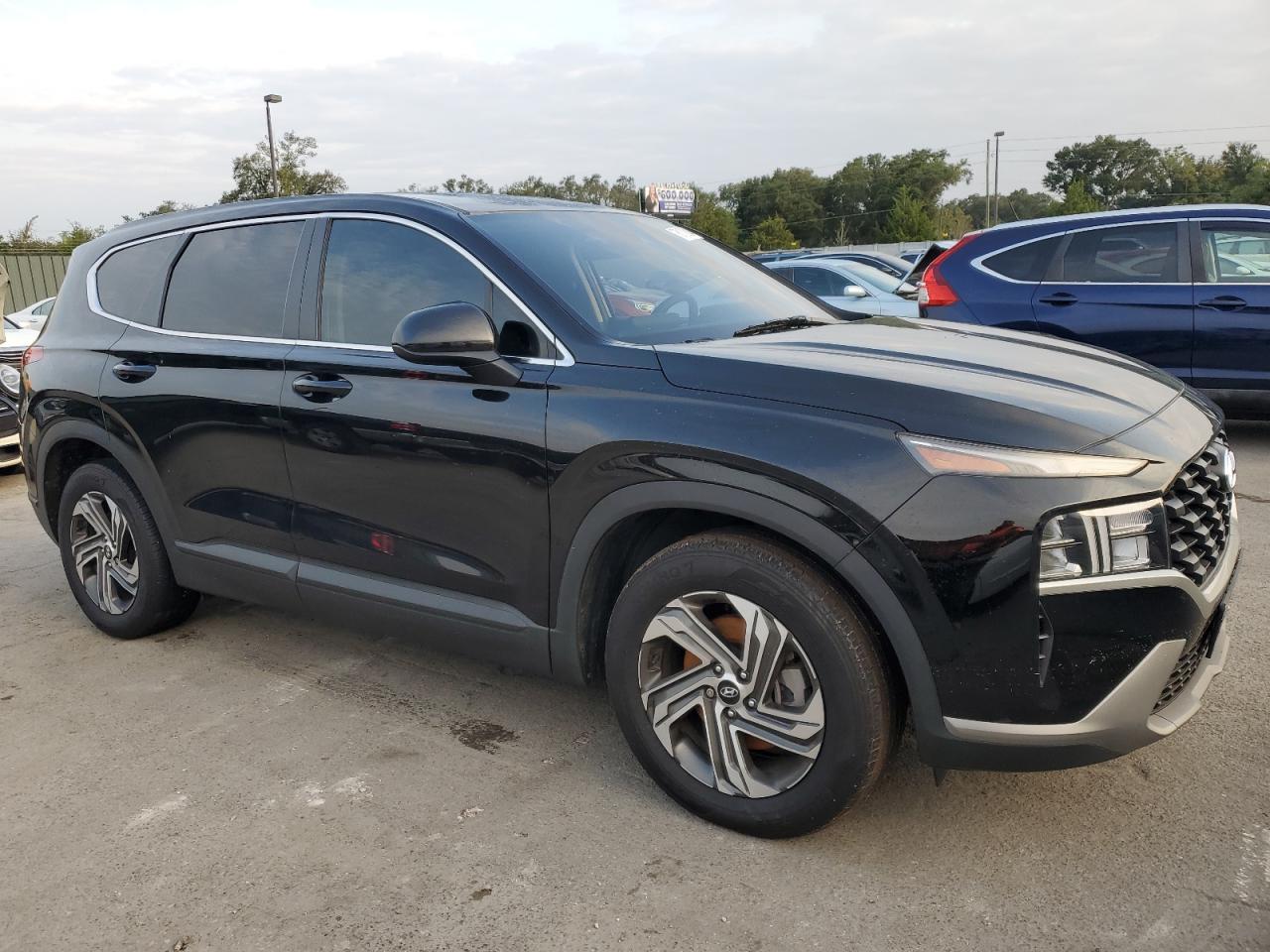 2023 Hyundai Santa Fe VIN 5NMS14AJ3PH563123 Copart auction photo, water/flood damage thumbnail 4