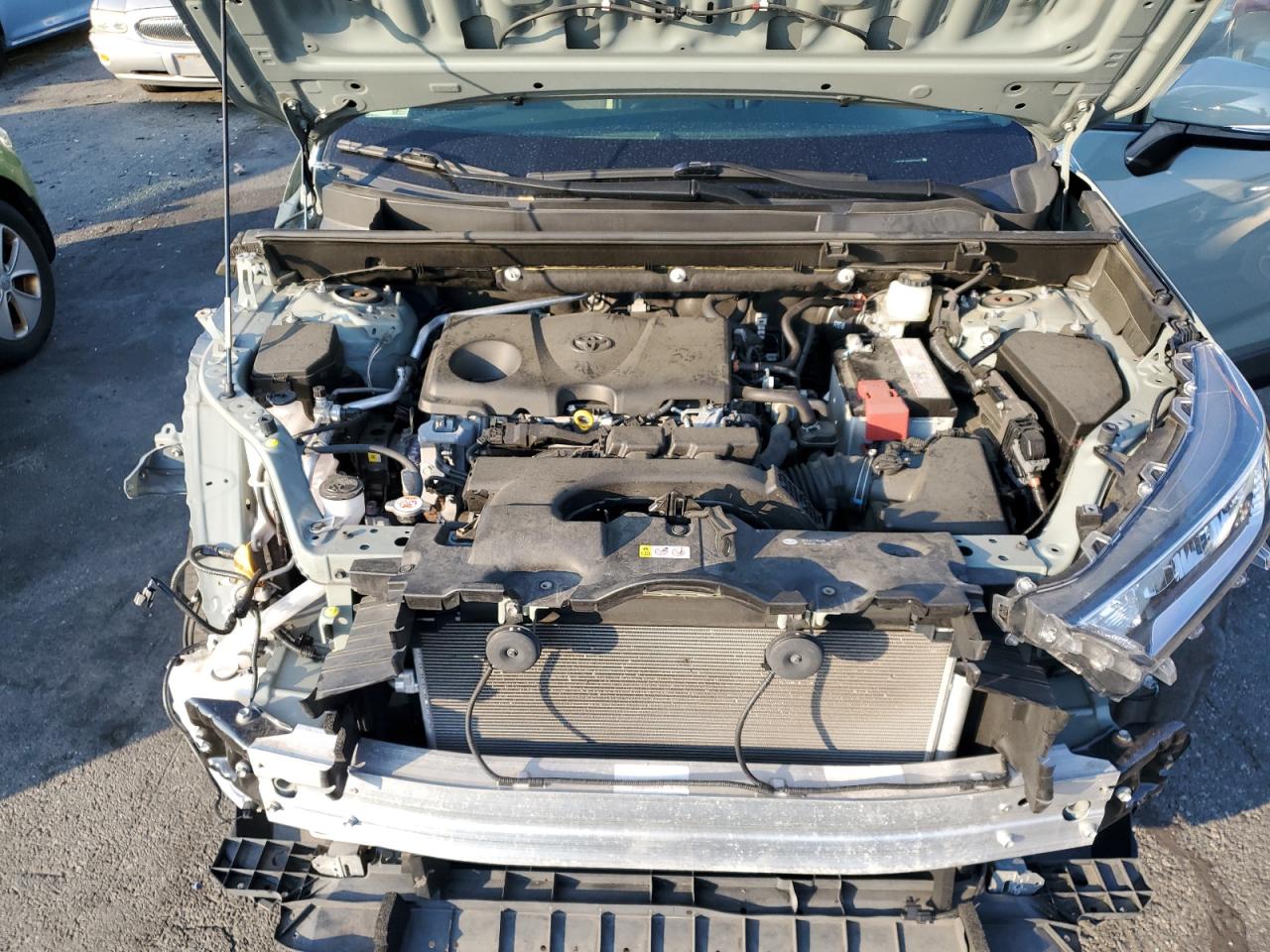 2019 Toyota RAV 4 VIN JTMP1RFV6KD040663 Copart auction photo, all over damage thumbnail 12