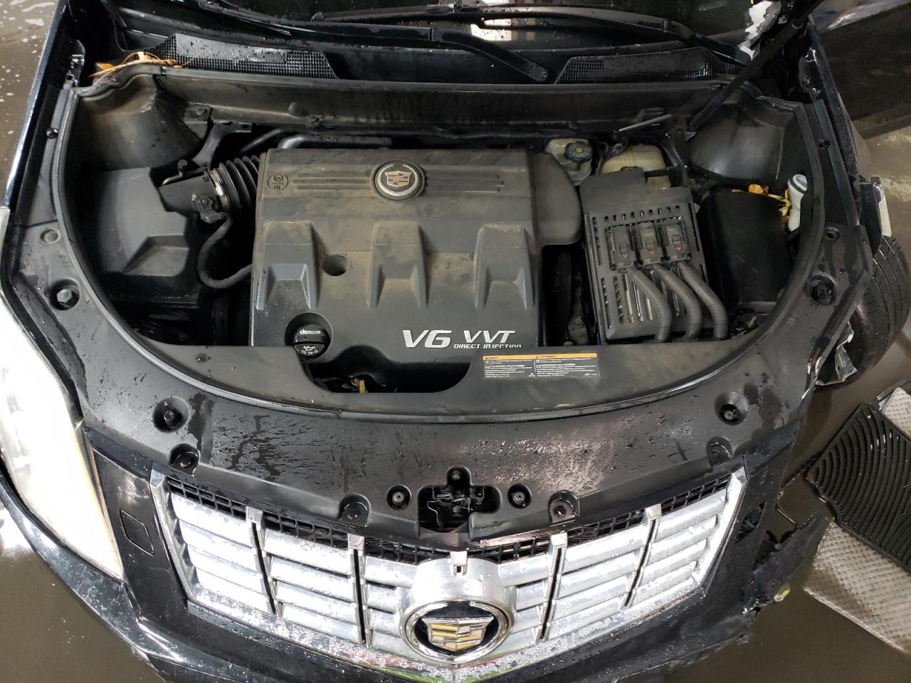 2013 Cadillac SRX VIN 3GYFNDE34DS528235 Copart auction photo, front end / side damage thumbnail 12