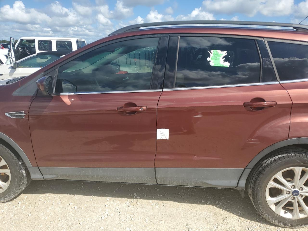2018 Ford Escape VIN 1FMCU0GD7JUC11356 Copart auction photo, water/flood damage thumbnail 13