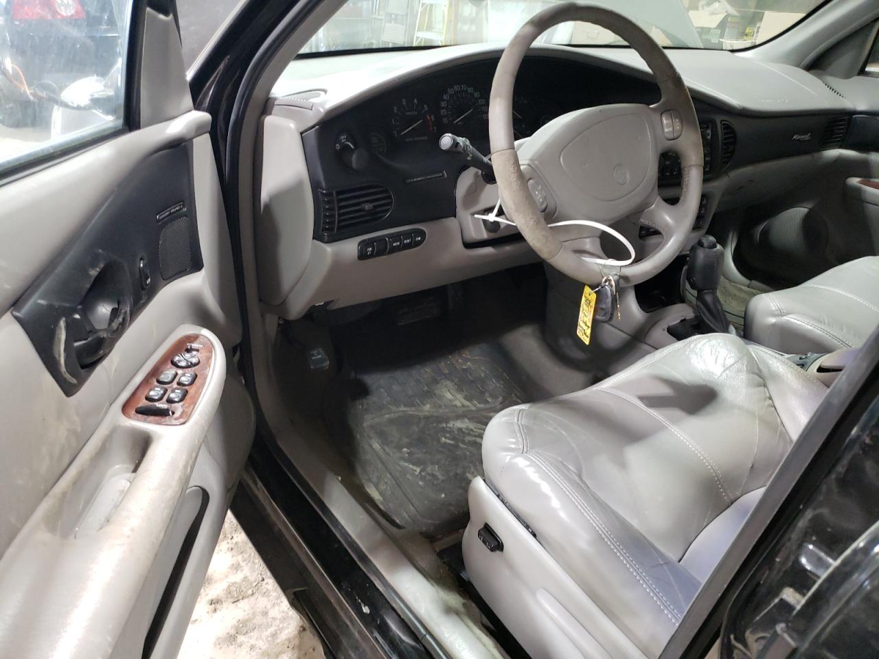 1999 Buick Regal VIN 2G4WF5219X1424704 Copart auction photo, all over damage thumbnail 8