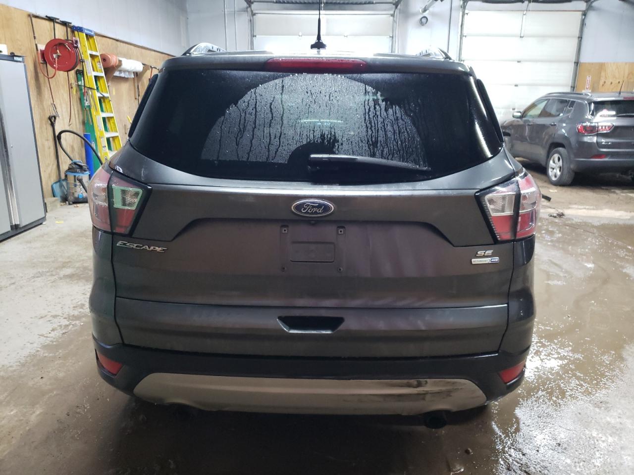 2018 Ford Escape VIN 1FMCU9GD8JUD43126 Copart auction photo, front end / minor dent/scratches damage thumbnail 6