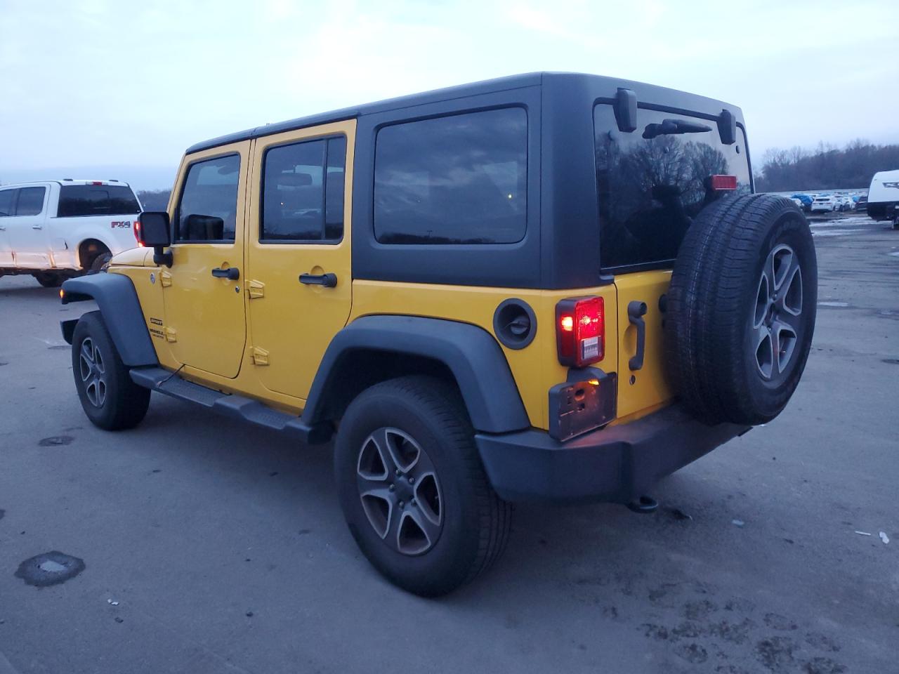 2015 Jeep Wrangler VIN 1C4BJWDG8FL566883 Copart auction photo, side damage thumbnail 2