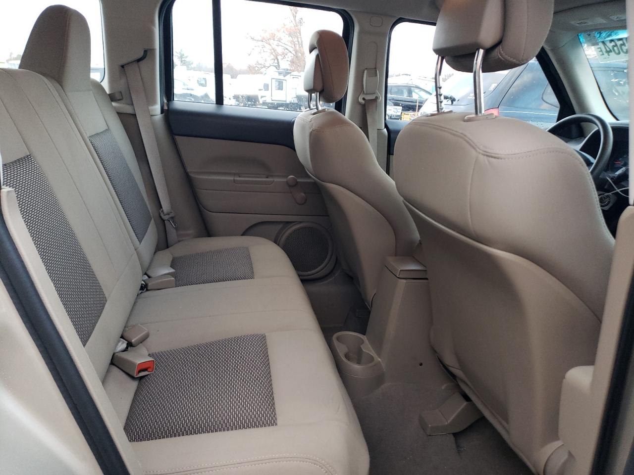 2010 Jeep Liberty (Patriot) VIN 1J4NF2GB2AD500530 Copart auction photo, side damage thumbnail 11