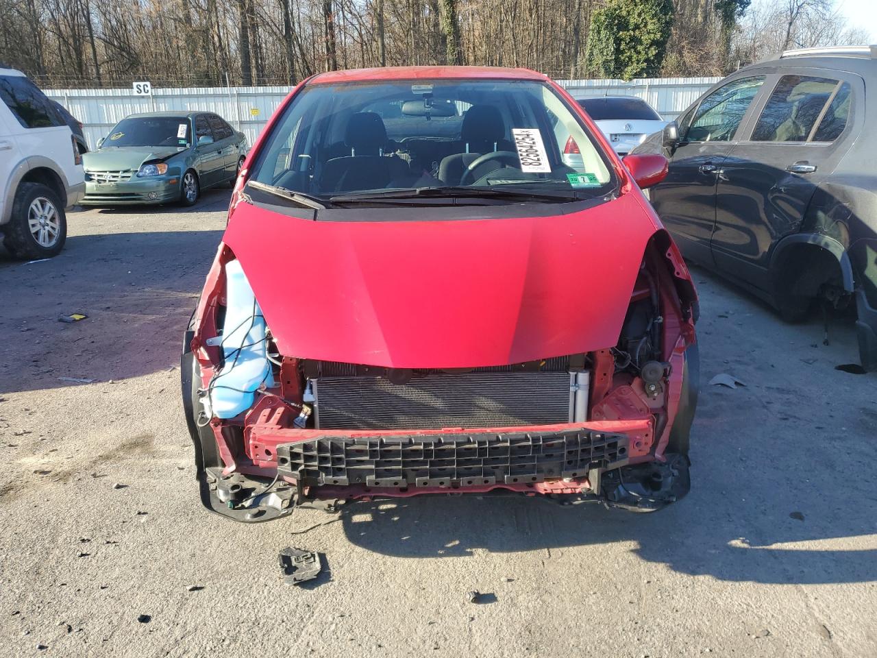 2012 Honda Fit VIN JHMGE8H61CC019679 Copart auction photo, front end / side damage thumbnail 5
