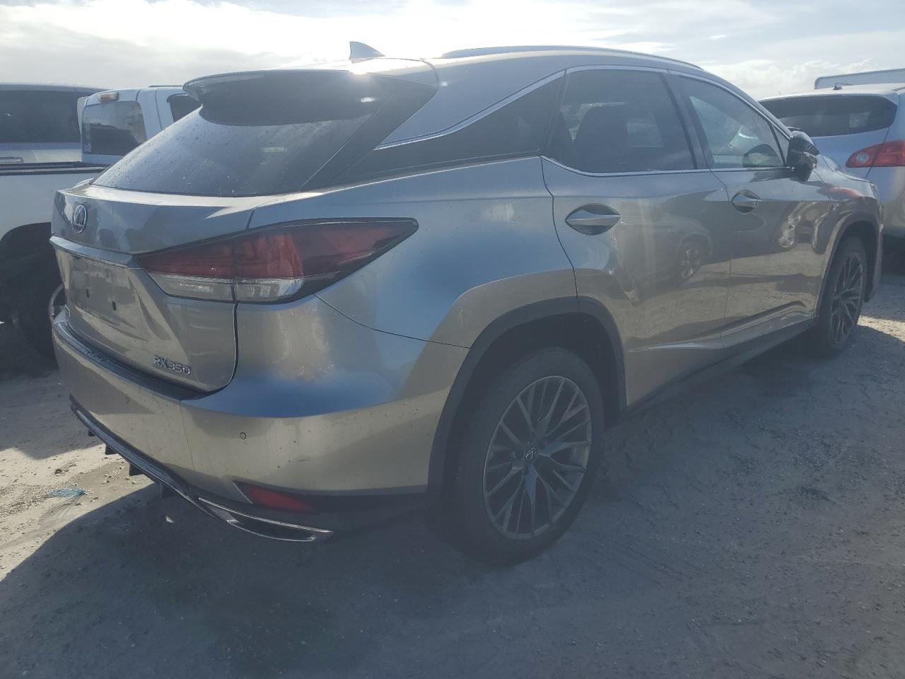 2021 Lexus RX VIN 2T2YZMDA7MC282776 Copart auction photo, vandalism damage thumbnail 3