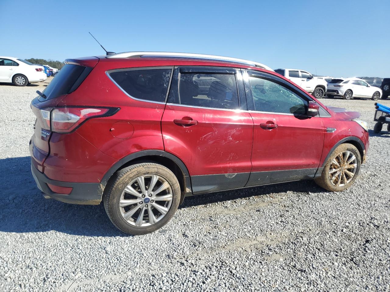 2017 Ford Escape VIN 1FMCU0JDXHUD15309 Copart auction photo, front end / water/flood damage thumbnail 3