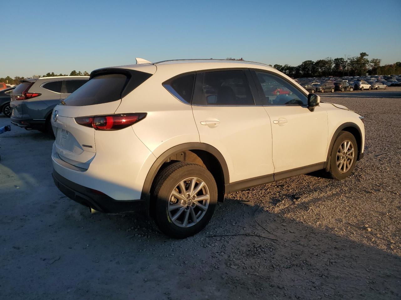 2022 Mazda CX-5 VIN JM3KFBCM2N0596681 Copart auction photo, front end / minor dent/scratches damage thumbnail 3
