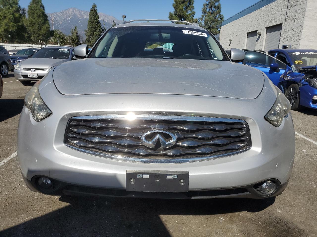 2011 Infiniti FX VIN JN8AS1MUXBM711531 Copart auction photo, vandalism damage thumbnail 5