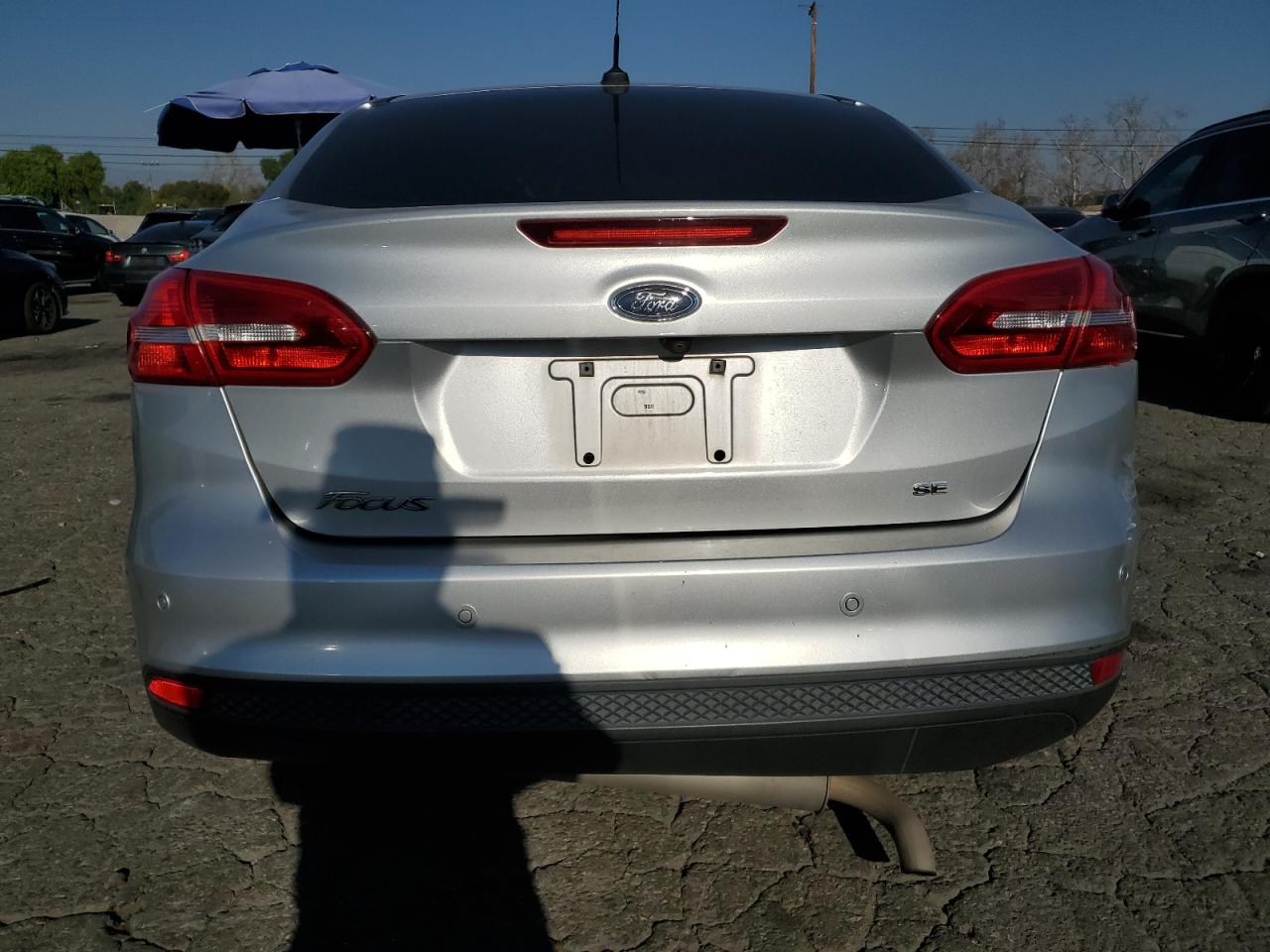 2016 Ford Focus VIN 1FADP3F20GL297597 Copart auction photo, rear end damage thumbnail 6