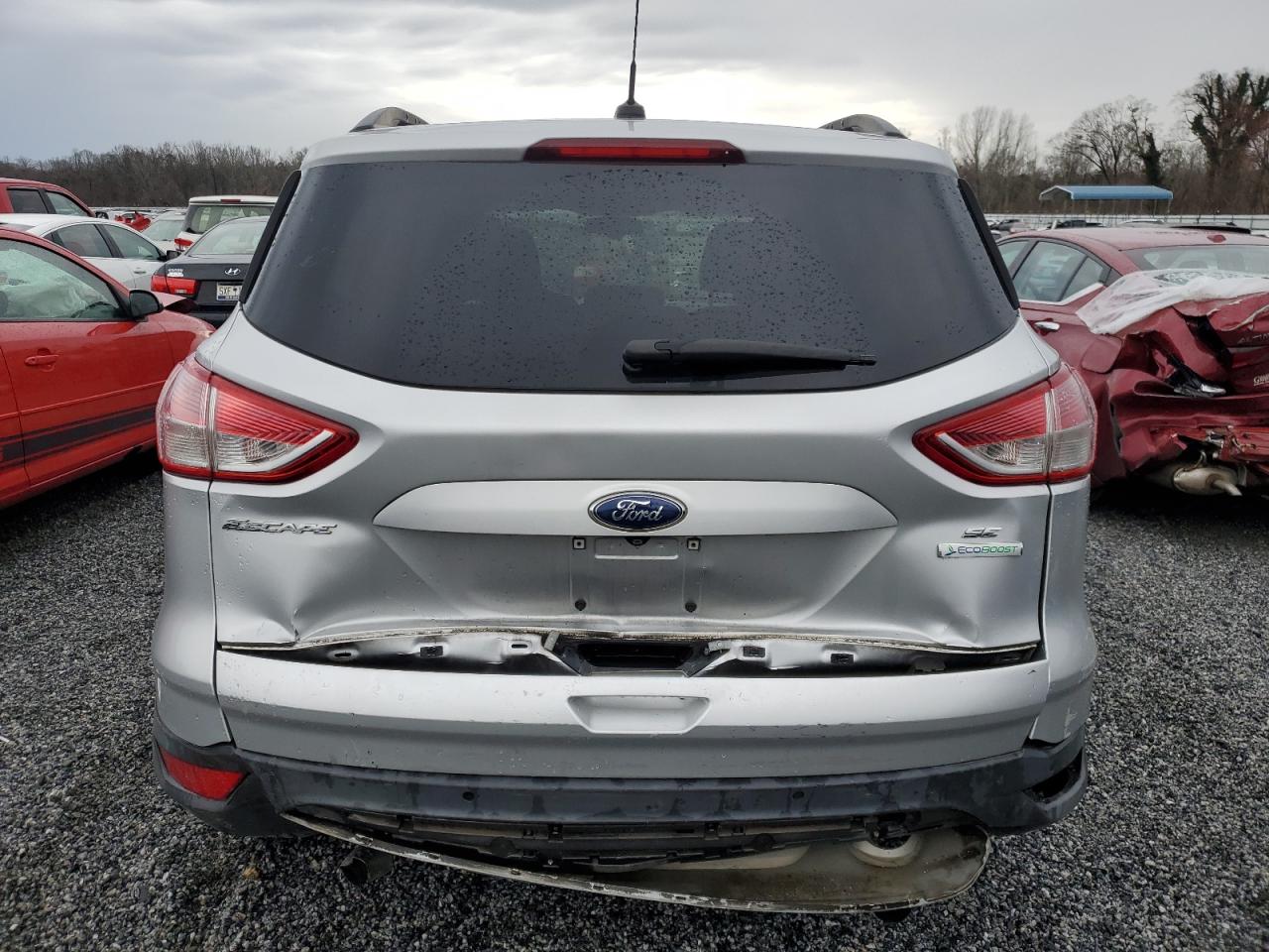 2015 Ford Escape VIN 1FMCU0GX8FUB55610 Copart auction photo, rear end damage thumbnail 6