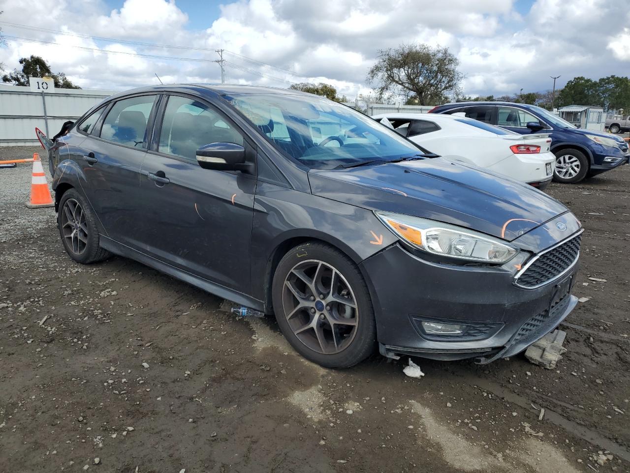 2015 Ford Focus VIN 1FADP3F2XFL314601 Copart auction photo, rear end damage thumbnail 4