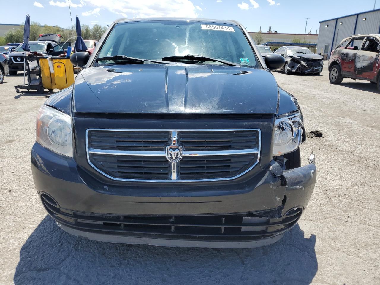 2009 Dodge Caliber VIN 1B3HB48A29D103266 Copart auction photo, front end damage thumbnail 5
