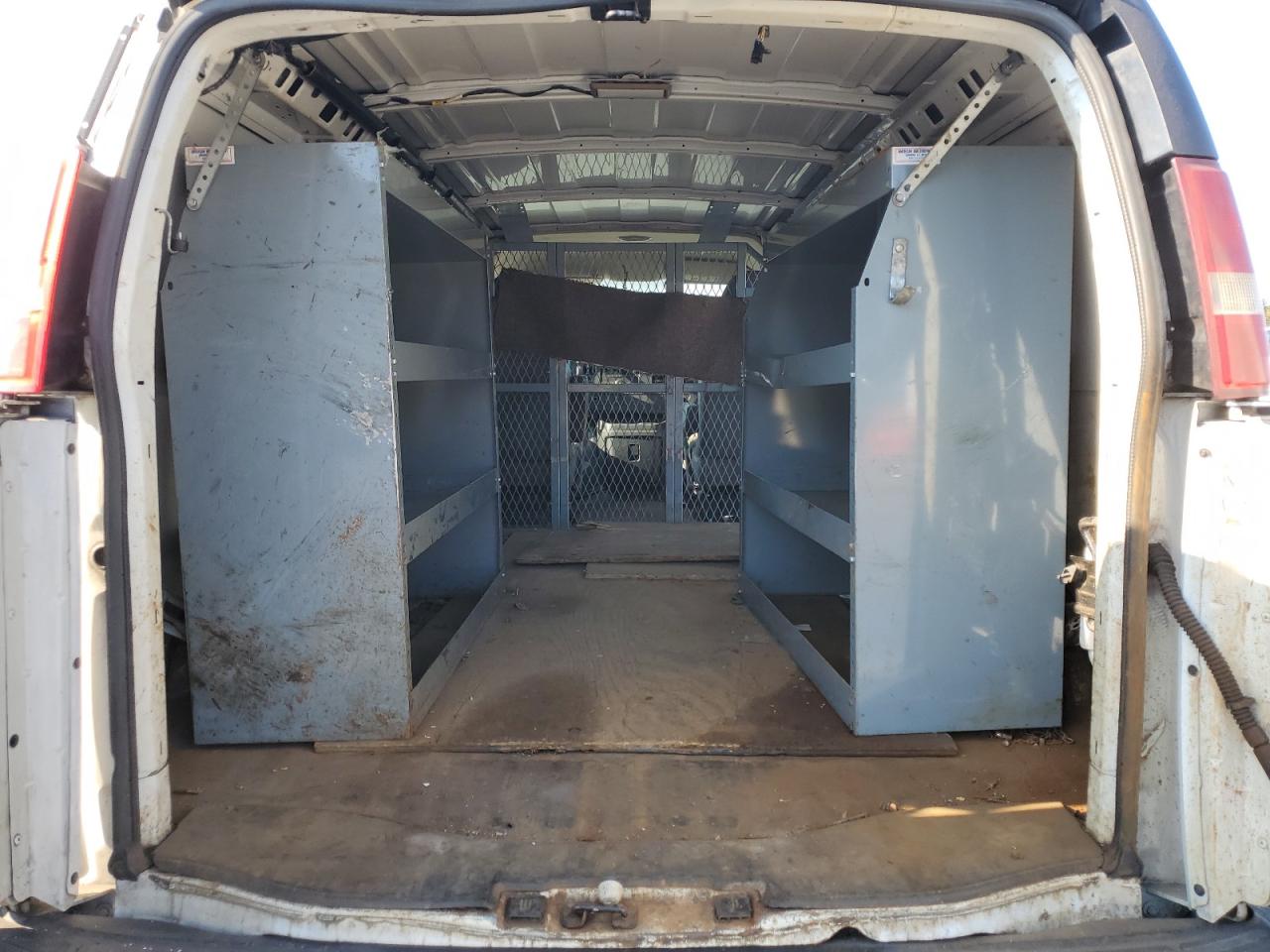 2014 Chevrolet Express VIN 1GCWGFCA9E1204049 Copart auction photo, side / mechanical damage thumbnail 10
