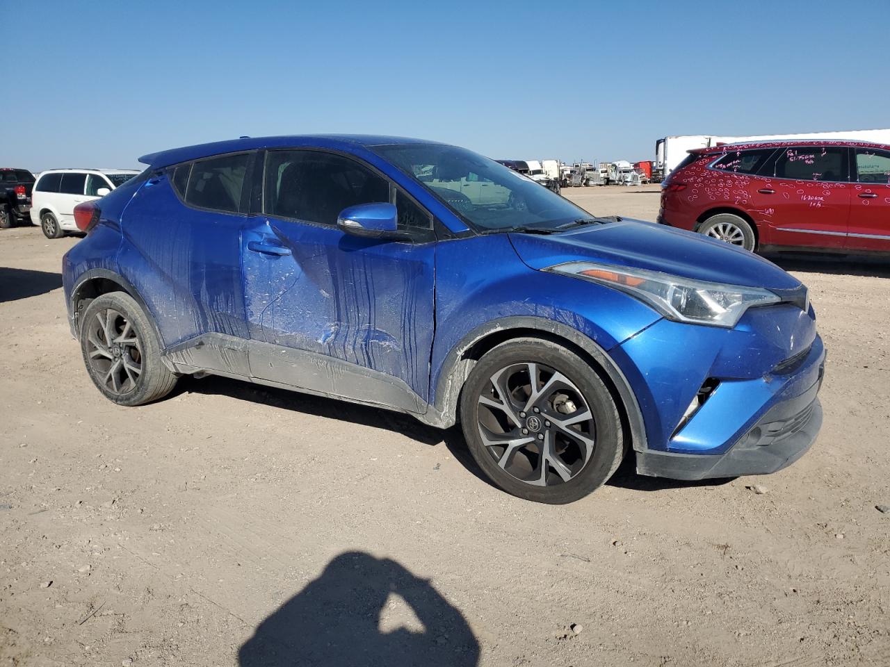 2018 Toyota C-HR VIN NMTKHMBX4JR060640 Copart auction photo, side / front end damage thumbnail 4