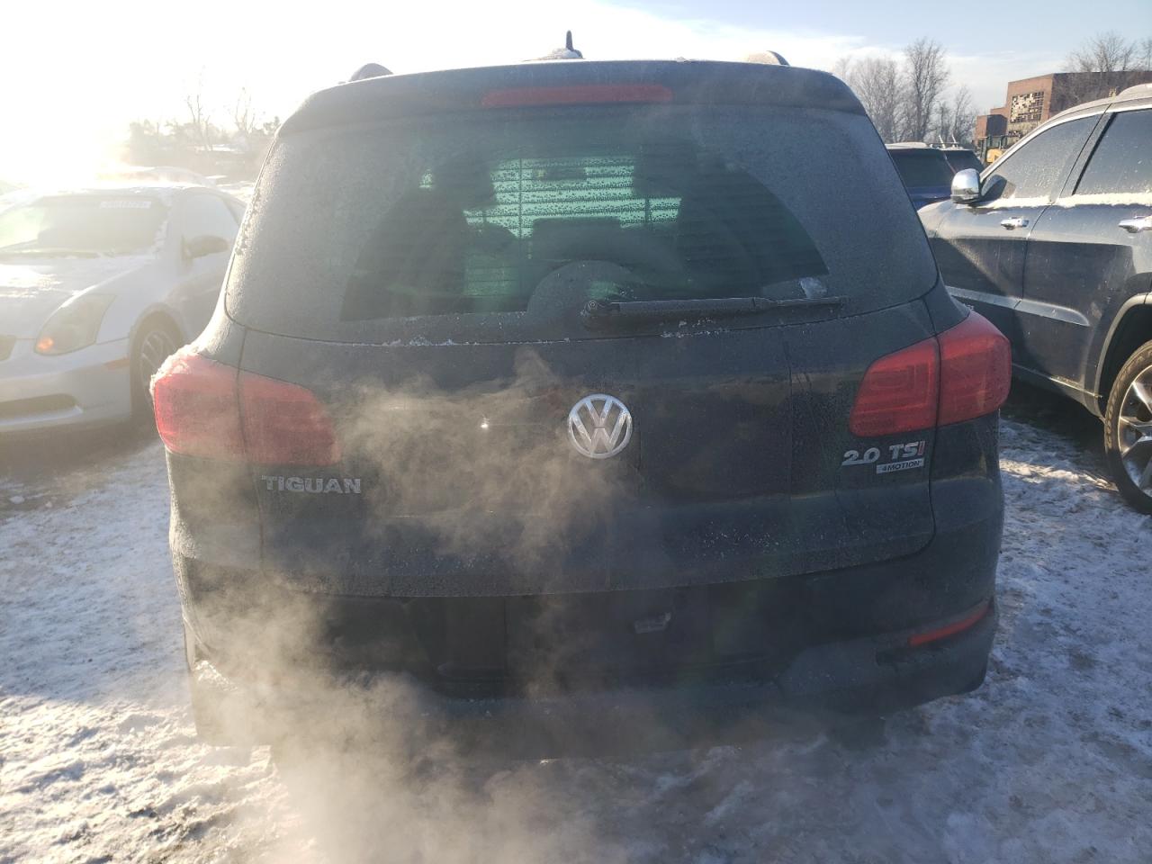 2015 Volkswagen Tiguan VIN WVGBV7AXXFW581510 Copart auction photo, front end / side damage thumbnail 6