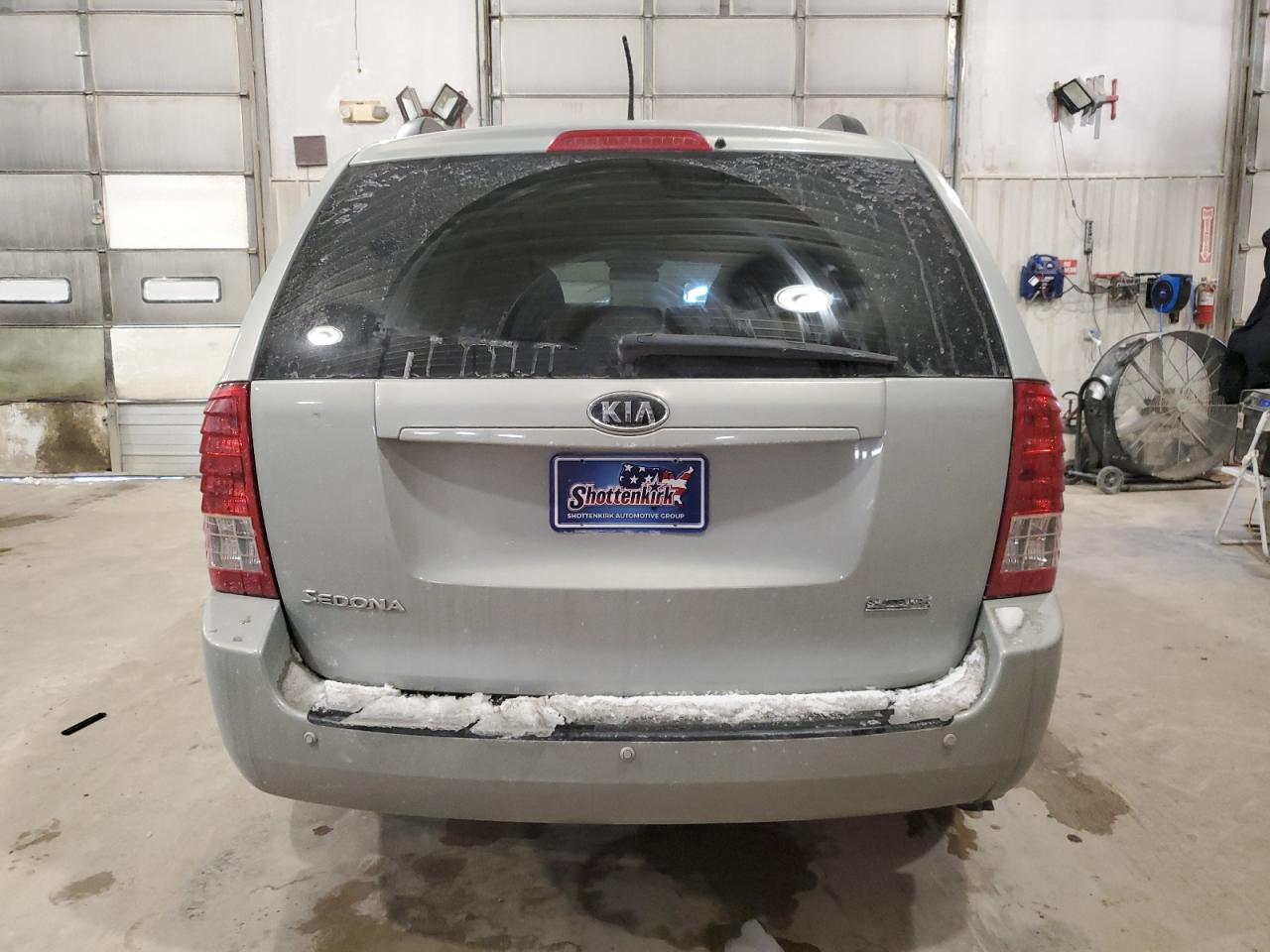 2012 KIA Sedona VIN KNDMG4C76C6505216 Copart auction photo, front end / minor dent/scratches damage thumbnail 6