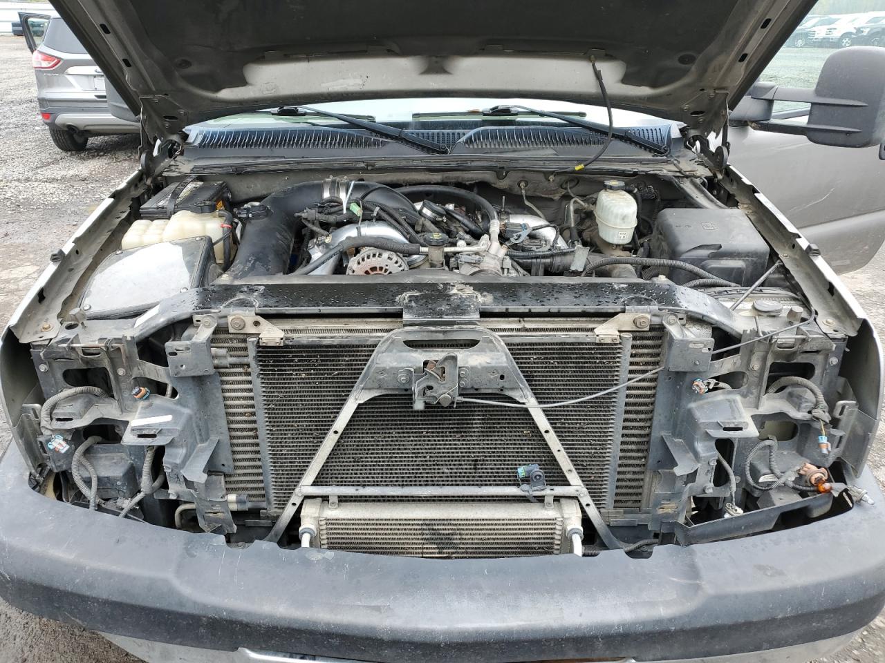 2006 Chevrolet Silverado VIN 1GCHK33D06F193124 Copart auction photo, front end / undercarriage damage thumbnail 11