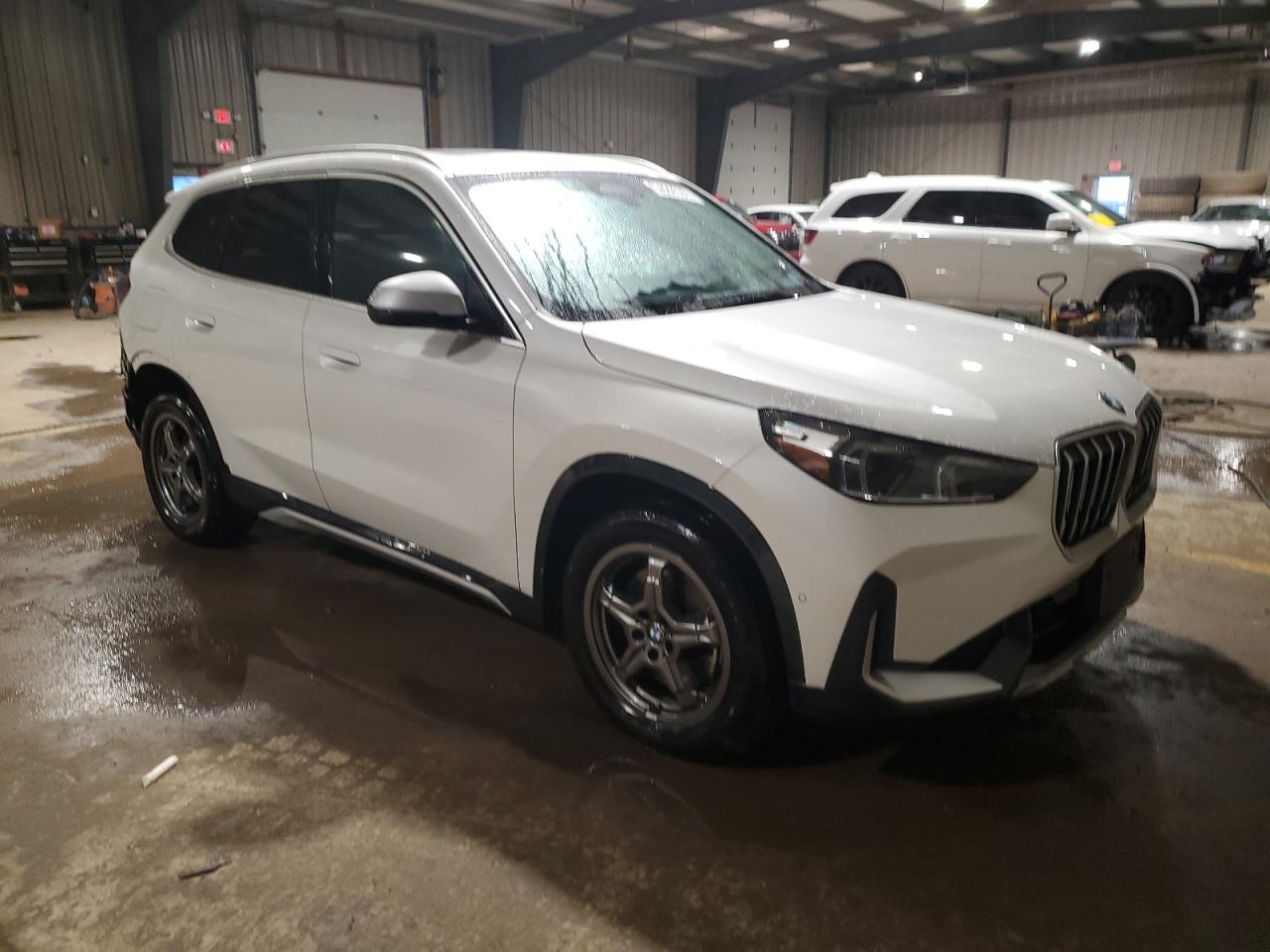 2024 BMW X1 VIN WBX73EF04R5Z84007 Copart auction photo, side / rear end damage thumbnail 4