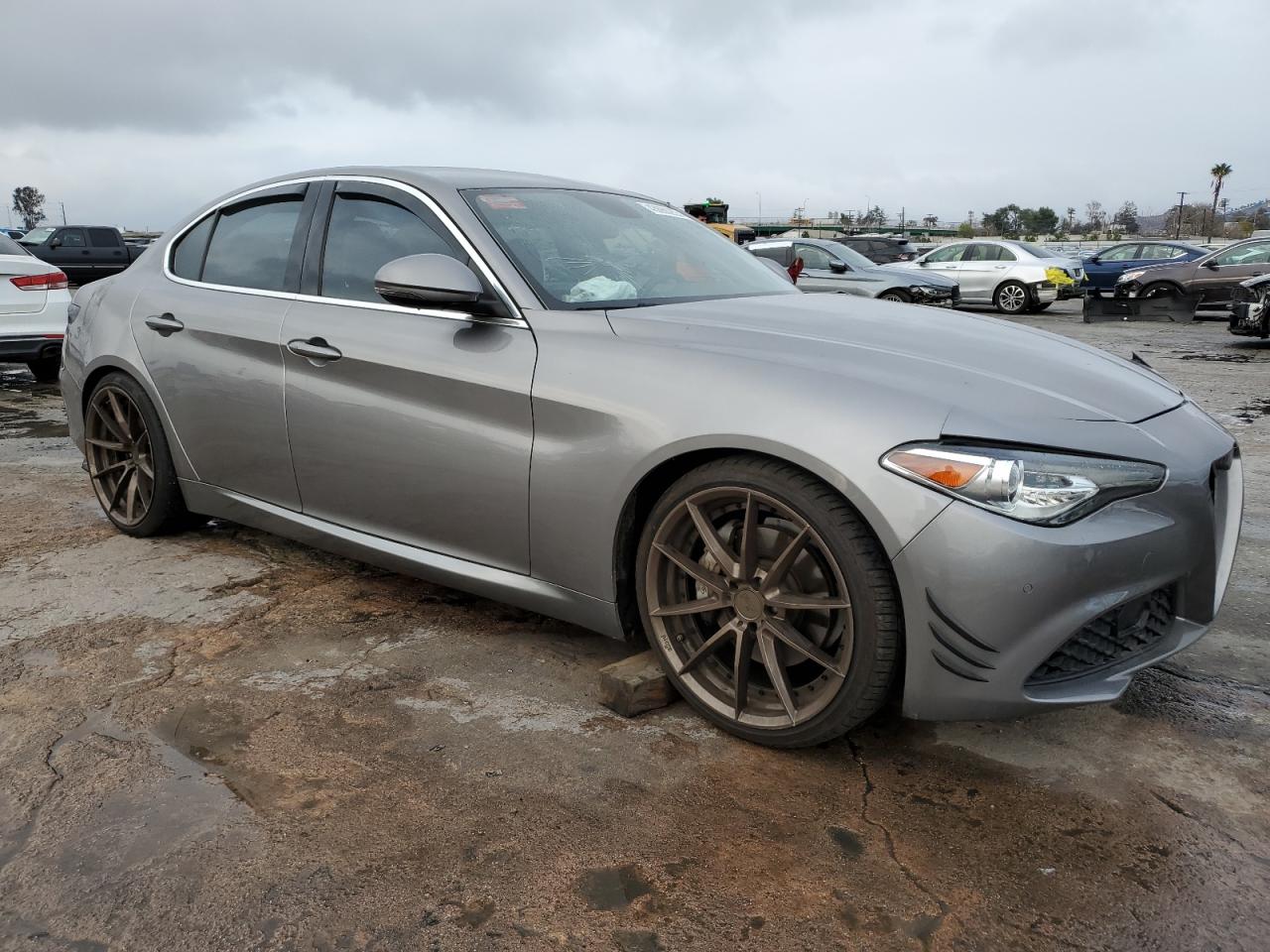 2017 Alfa Romeo Giulia VIN ZARFAECN5H7544840 Copart auction photo, side / front end damage thumbnail 4