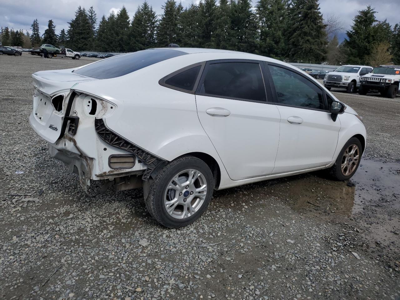 2014 Ford Fiesta VIN 3FADP4BJ3EM179901 Copart auction photo, rear end damage thumbnail 3