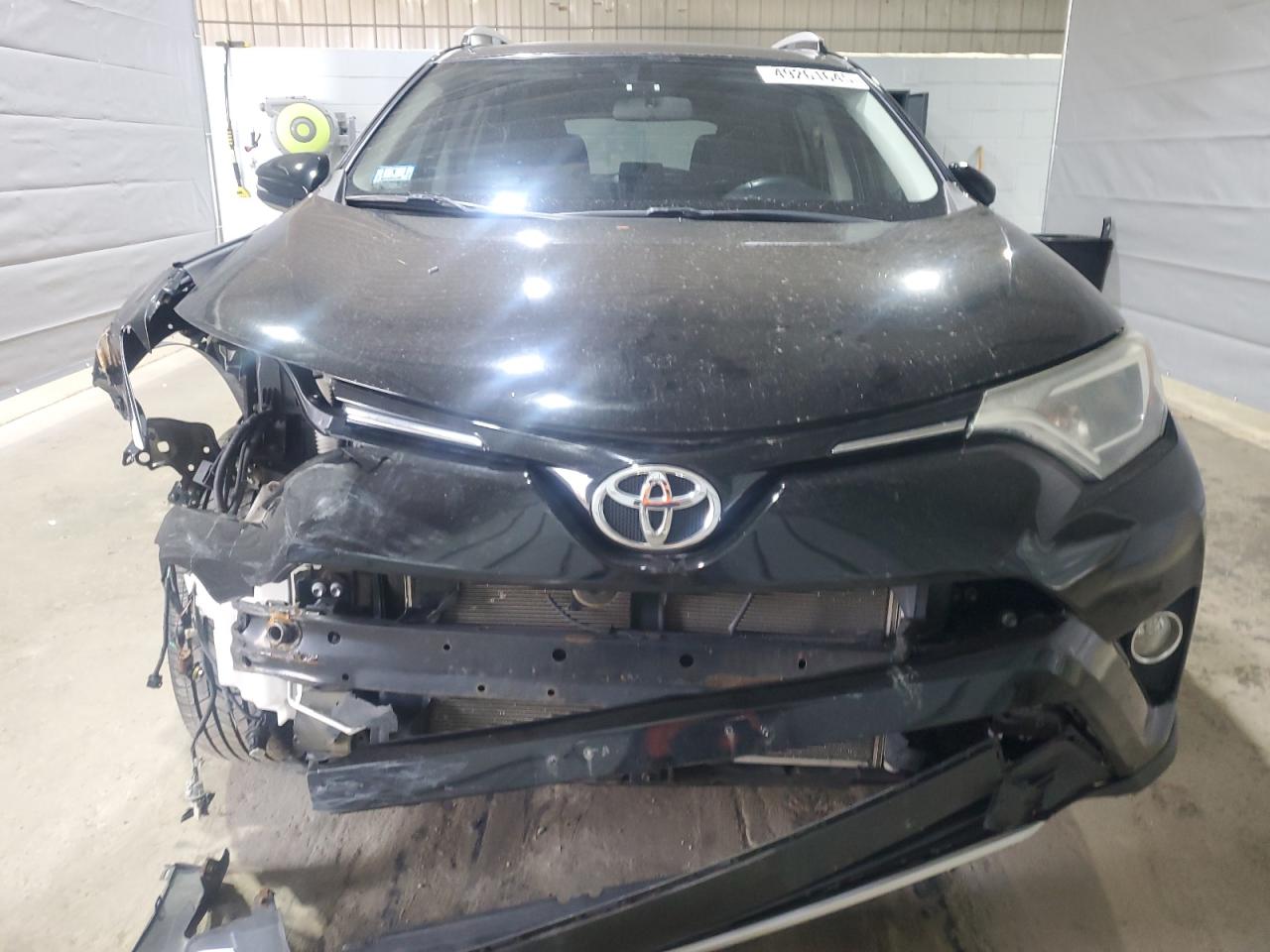 2016 Toyota RAV 4 VIN 2T3RFREV4GW510128 Copart auction photo, front end / minor dent/scratches damage thumbnail 5