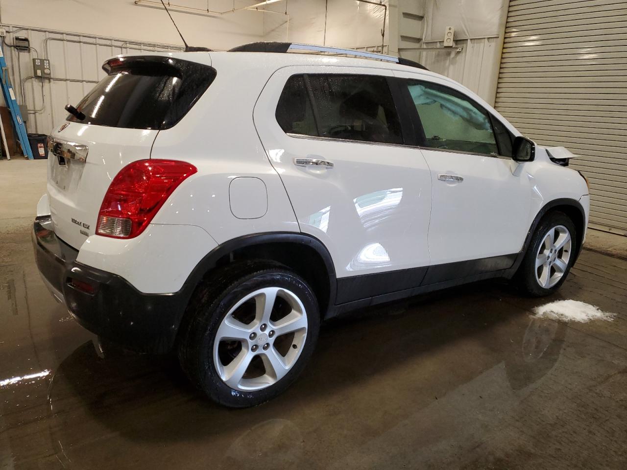 2015 Chevrolet Trax VIN 3GNCJTSB9FL245151 Copart auction photo, front end / rear end damage thumbnail 3