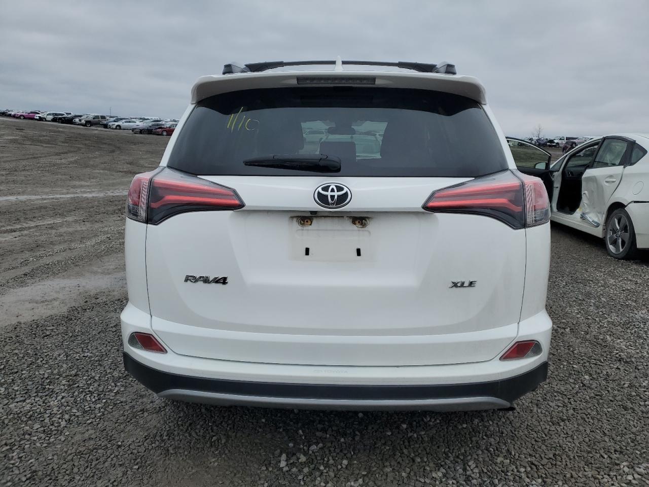 2018 Toyota RAV 4 VIN JTMWFREV4JJ748683 Copart auction photo, front end / rear end damage thumbnail 6