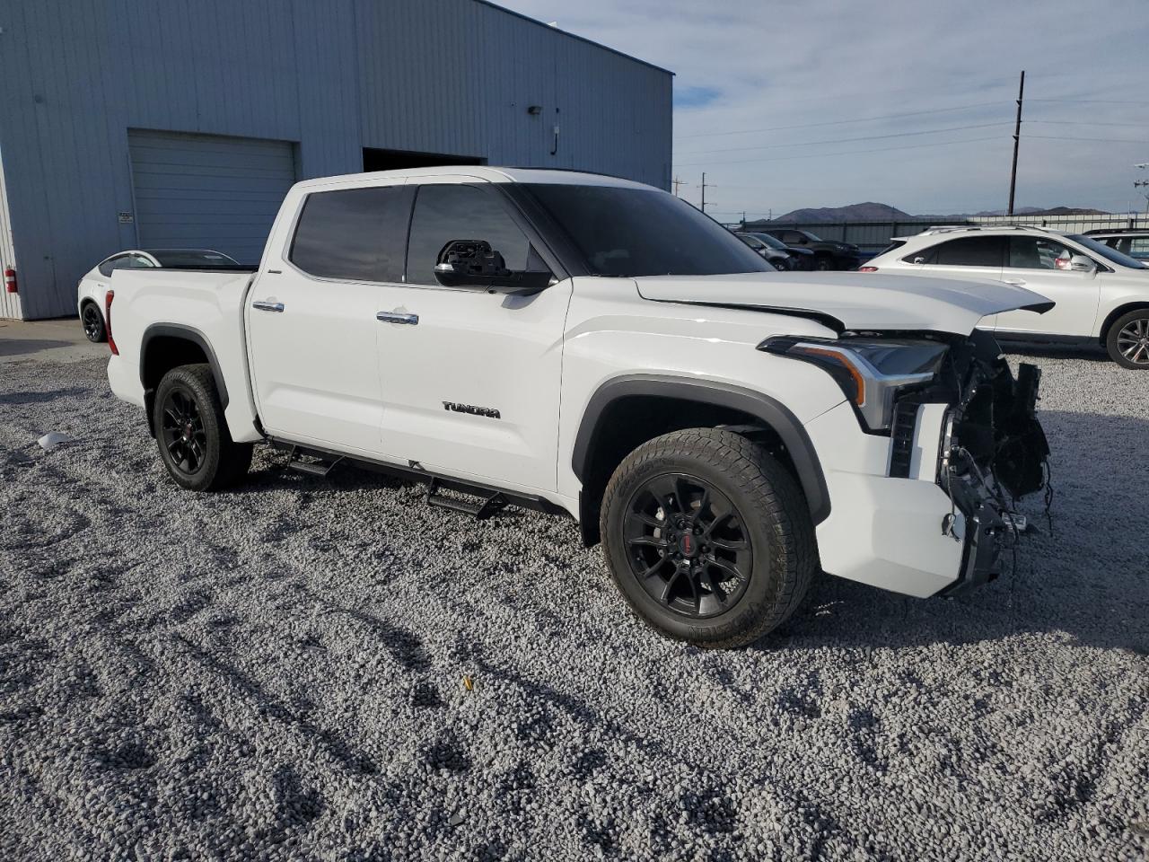 2022 Toyota Tundra VIN 5TFJA5DB2NX021229 Copart auction photo, front end damage thumbnail 4