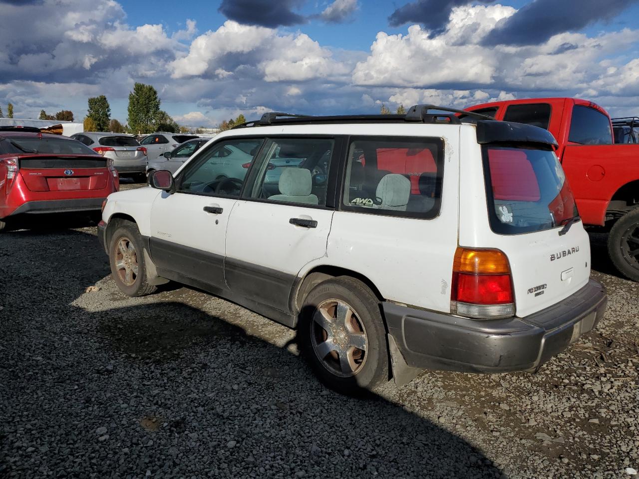 2000 Subaru Forester VIN JF1SF6558YH704545 Copart auction photo, side damage thumbnail 2
