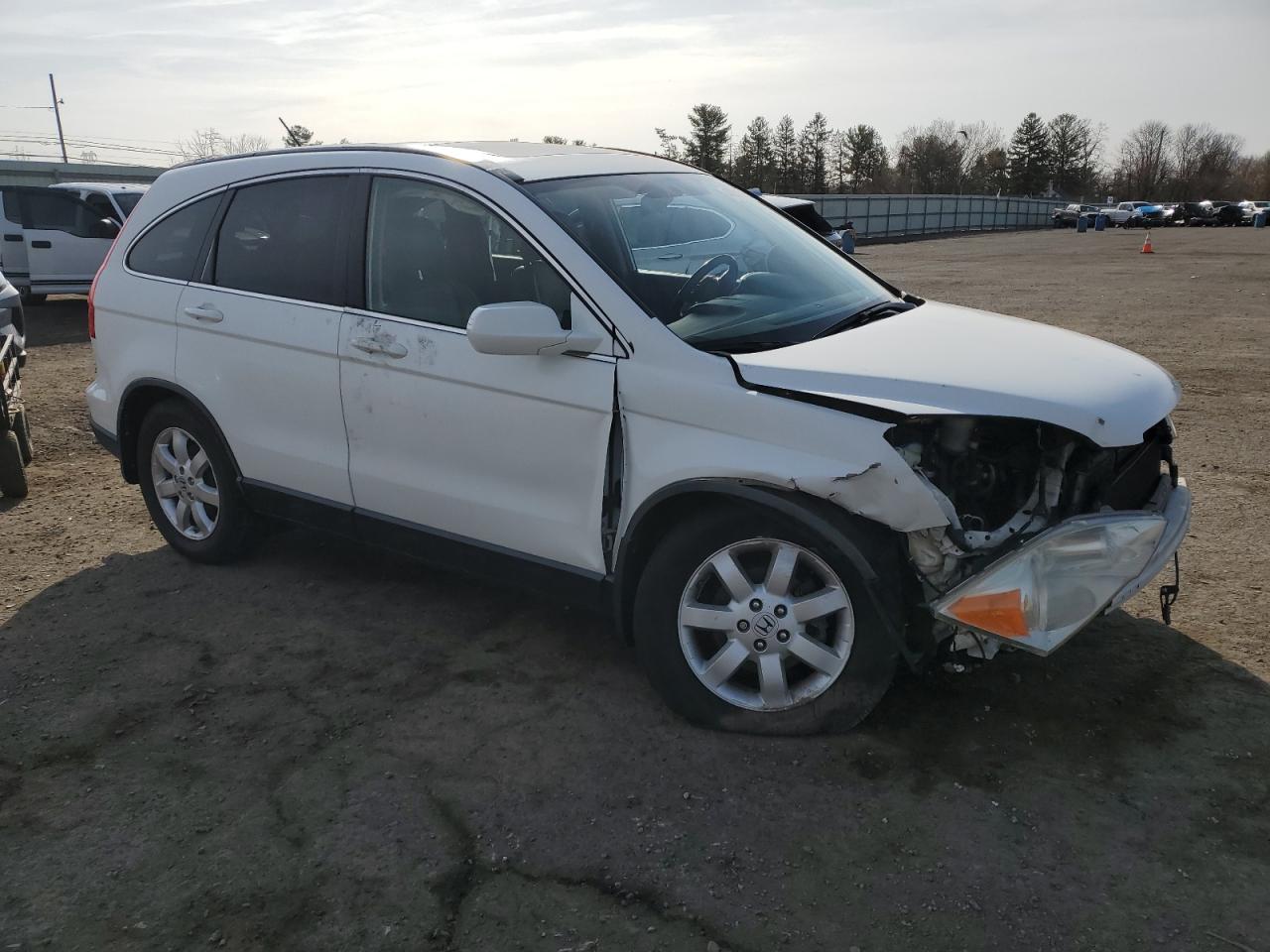2009 Honda CR-V VIN JHLRE38719C010935 Copart auction photo, front end / side damage thumbnail 4