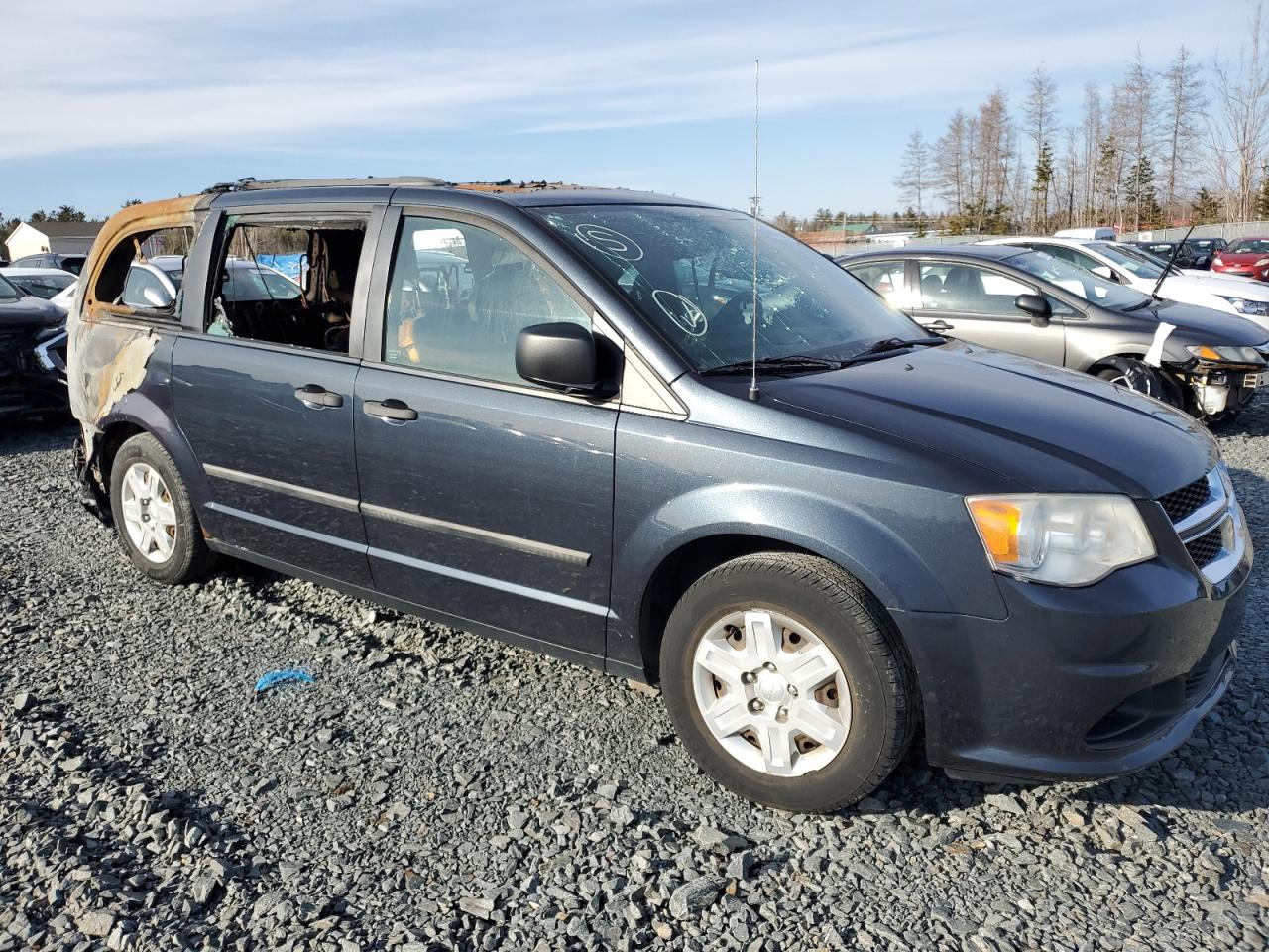 2013 Dodge Caravan VIN 2C4RDGBG3DR592245 Copart auction photo, burn damage thumbnail 4
