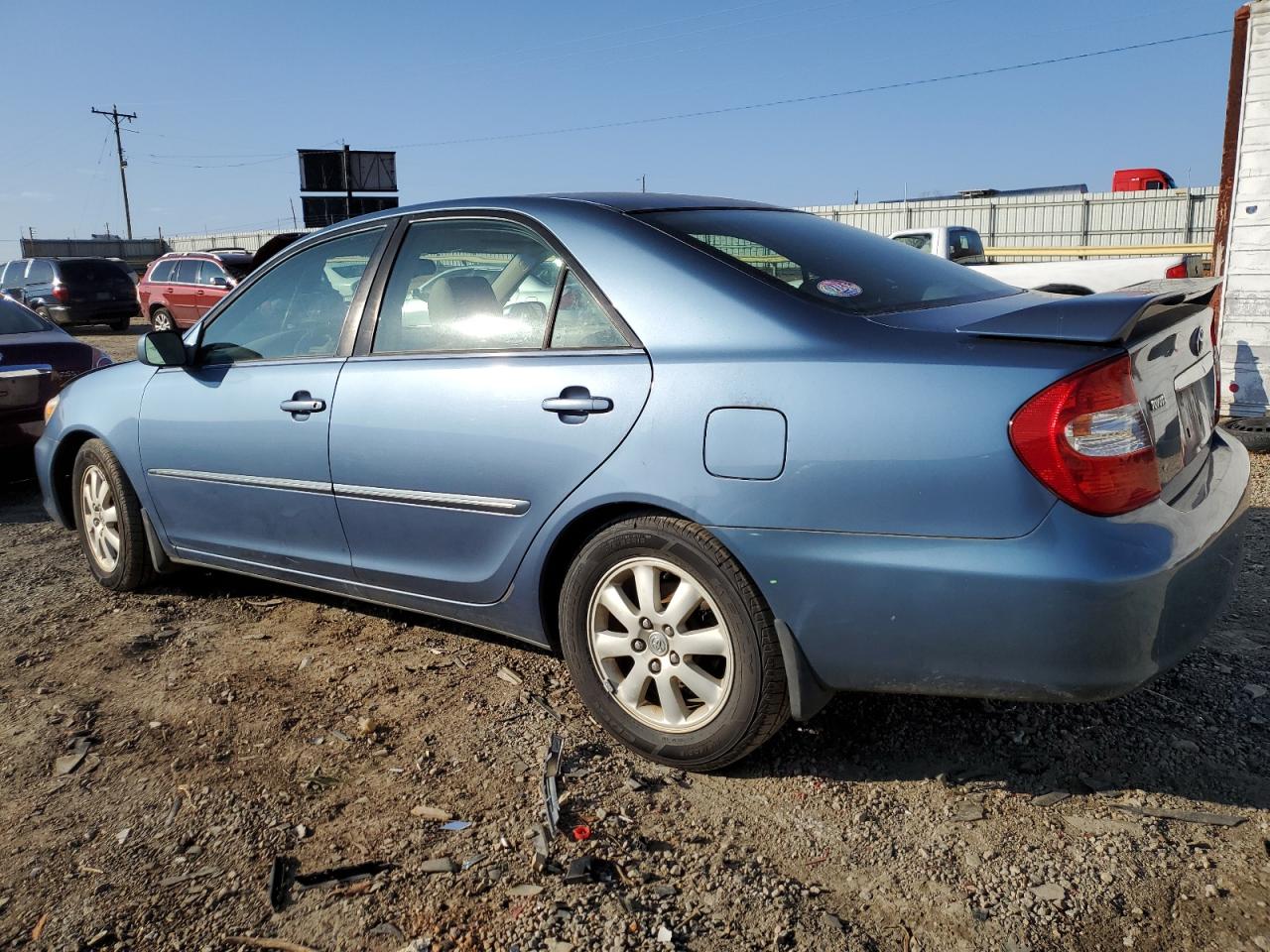 2002 Toyota Camry VIN 4T1BF30K32U537477 Copart auction photo, front end / minor dent/scratches damage thumbnail 2