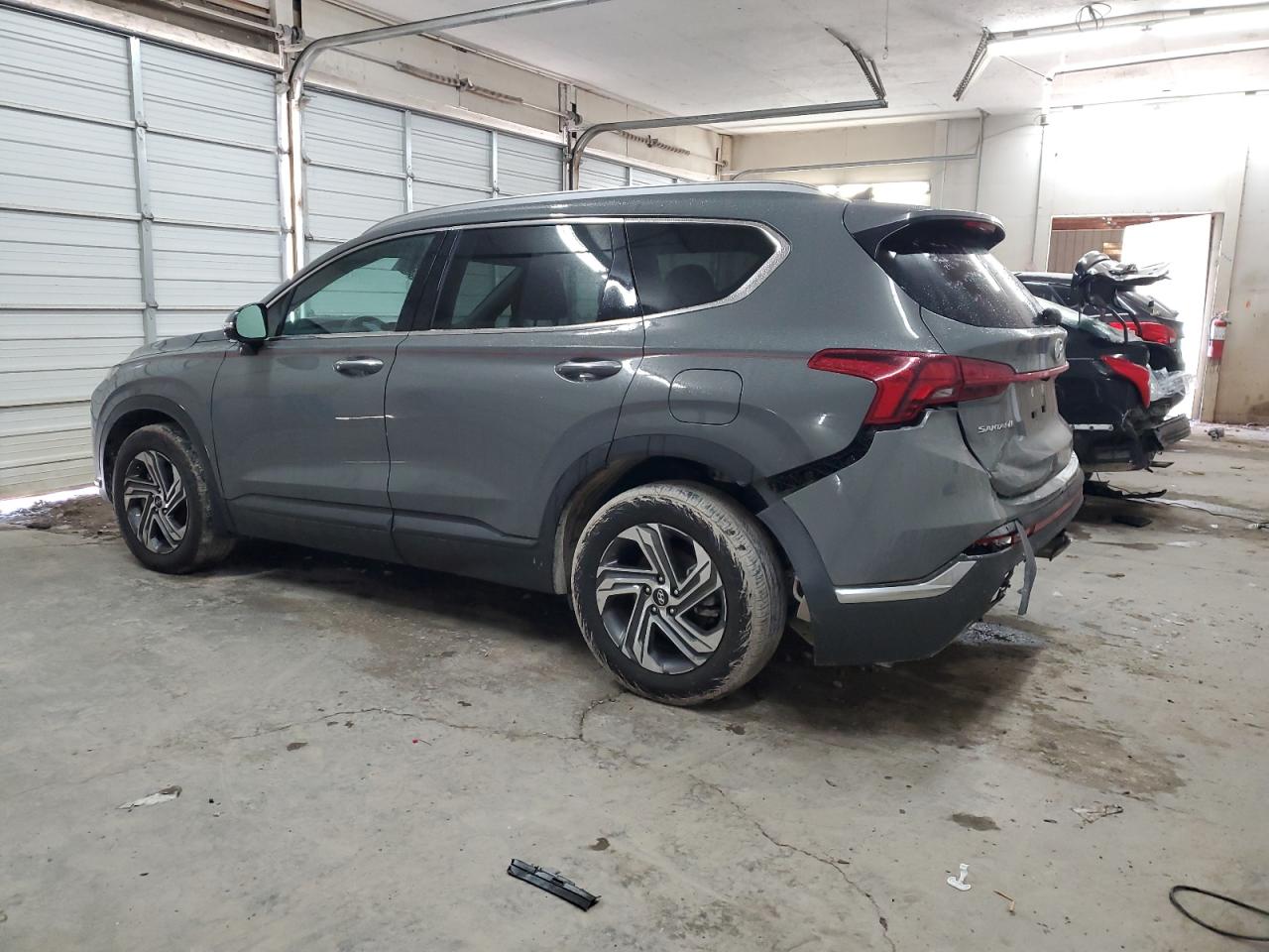 2023 Hyundai Santa Fe VIN 5NMS24AJ9PH634807 Copart auction photo, rear end / minor dent/scratches damage thumbnail 2