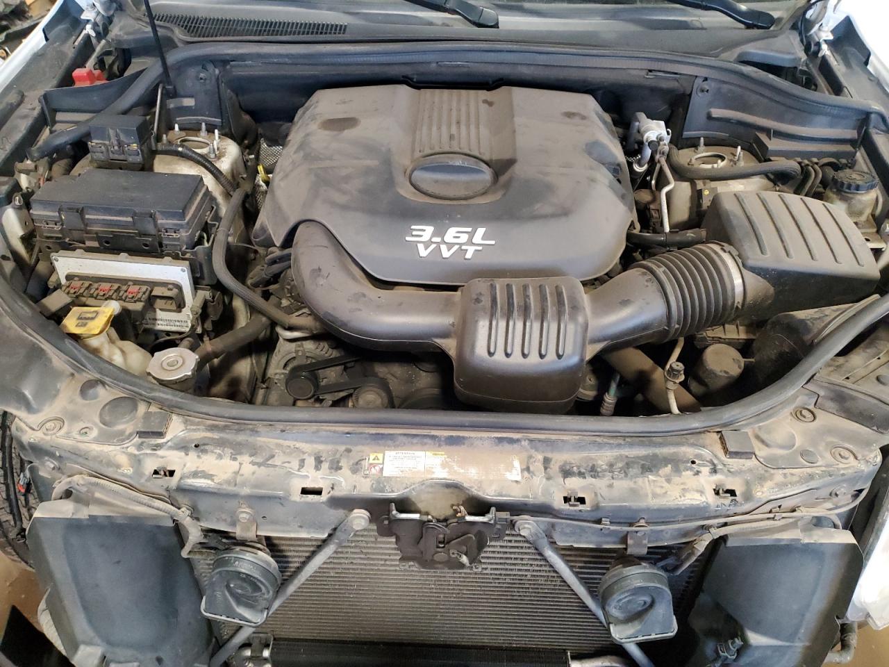2012 Jeep Grand Cherokee VIN 1C4RJFAG6CC165377 Copart auction photo, front end damage thumbnail 12