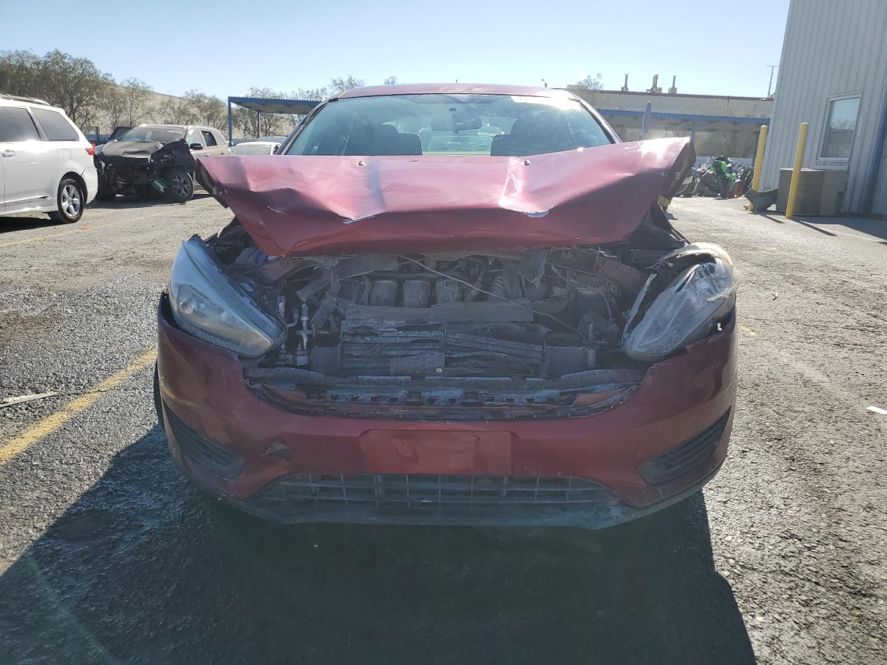 2017 Ford Focus VIN 1FADP3F2XHL329201 Copart auction photo, front end / rear end damage thumbnail 5