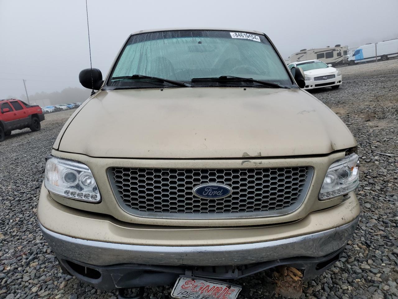 1999 Ford F-150 VIN 1FTRX18L7XNB64656 Copart auction photo, all over damage thumbnail 5