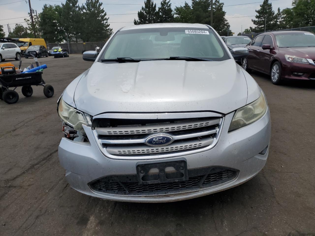 2011 Ford Taurus VIN 1FAHP2JW9BG142926 Copart auction photo, front end / side damage thumbnail 5