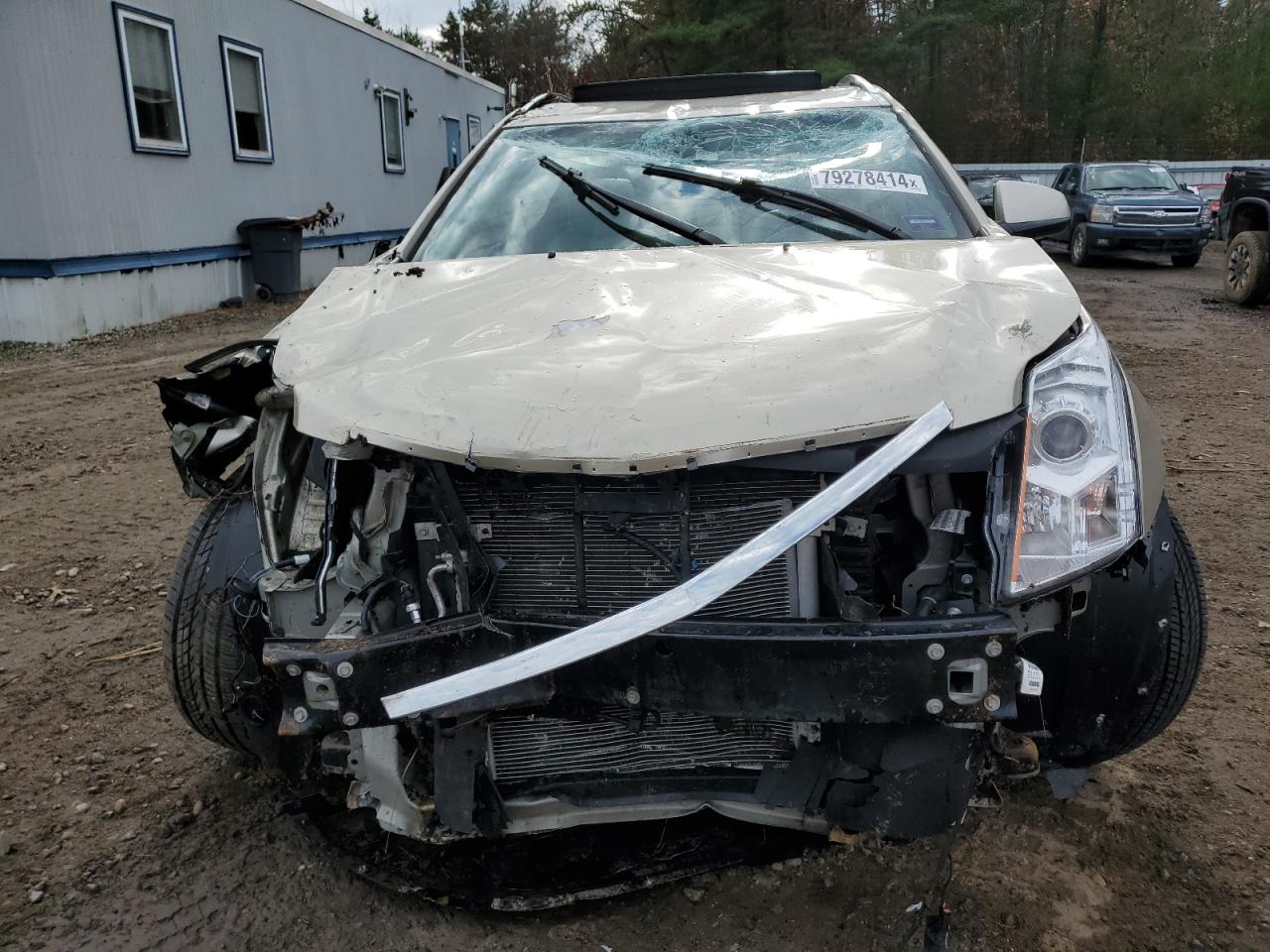 2016 Cadillac SRX VIN 3GYFNBE34GS570915 Copart auction photo, rollover damage thumbnail 5