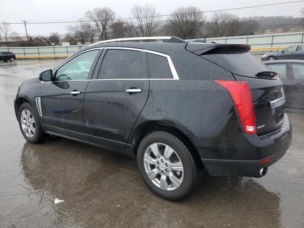 2015 Cadillac SRX VIN 3GYFNBE37FS558417 Copart auction photo, front end / side damage thumbnail 2
