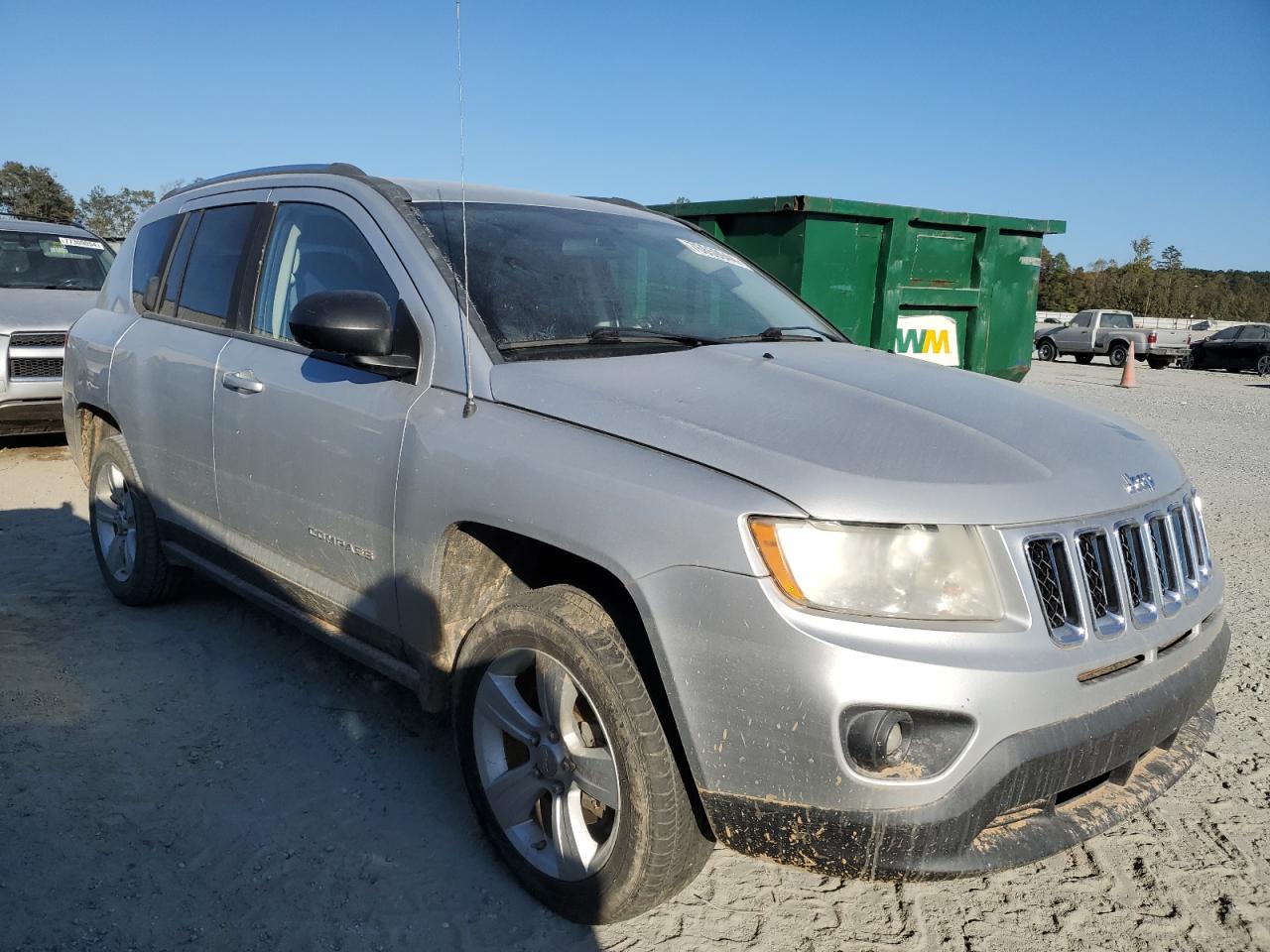 2012 Jeep Compass VIN 1C4NJDBBXCD705717 Copart auction photo, water/flood / minor dent/scratches damage thumbnail 4