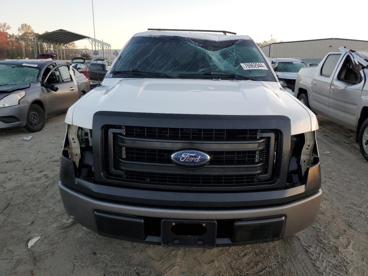 2013 Ford F-150 VIN 1FTMF1CM0DKE29377 Copart auction photo, water/flood / top/roof damage thumbnail 5