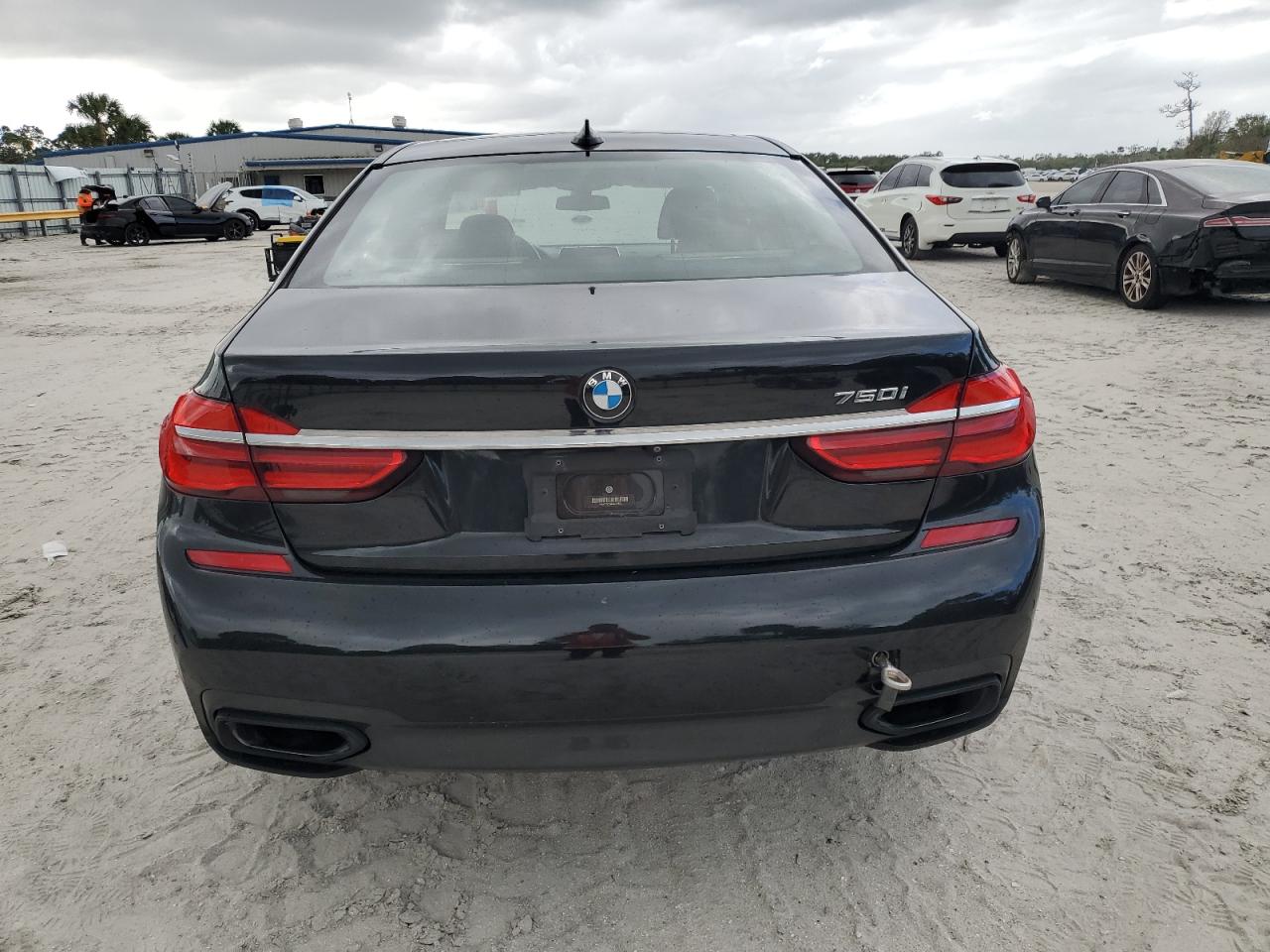 2019 BMW 7er VIN WBA7F0C54KGM24812 Copart auction photo, water/flood / minor dent/scratches damage thumbnail 6