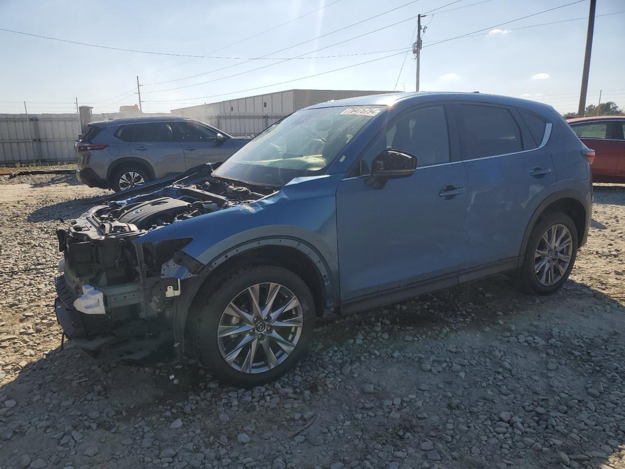 2021 Mazda CX-5 VIN JM3KFADM7M0355447