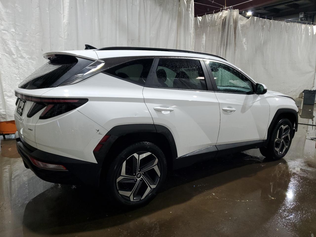 2023 Hyundai Tucson VIN 5NMJFCAE9PH276122 Copart auction photo, front end damage thumbnail 3