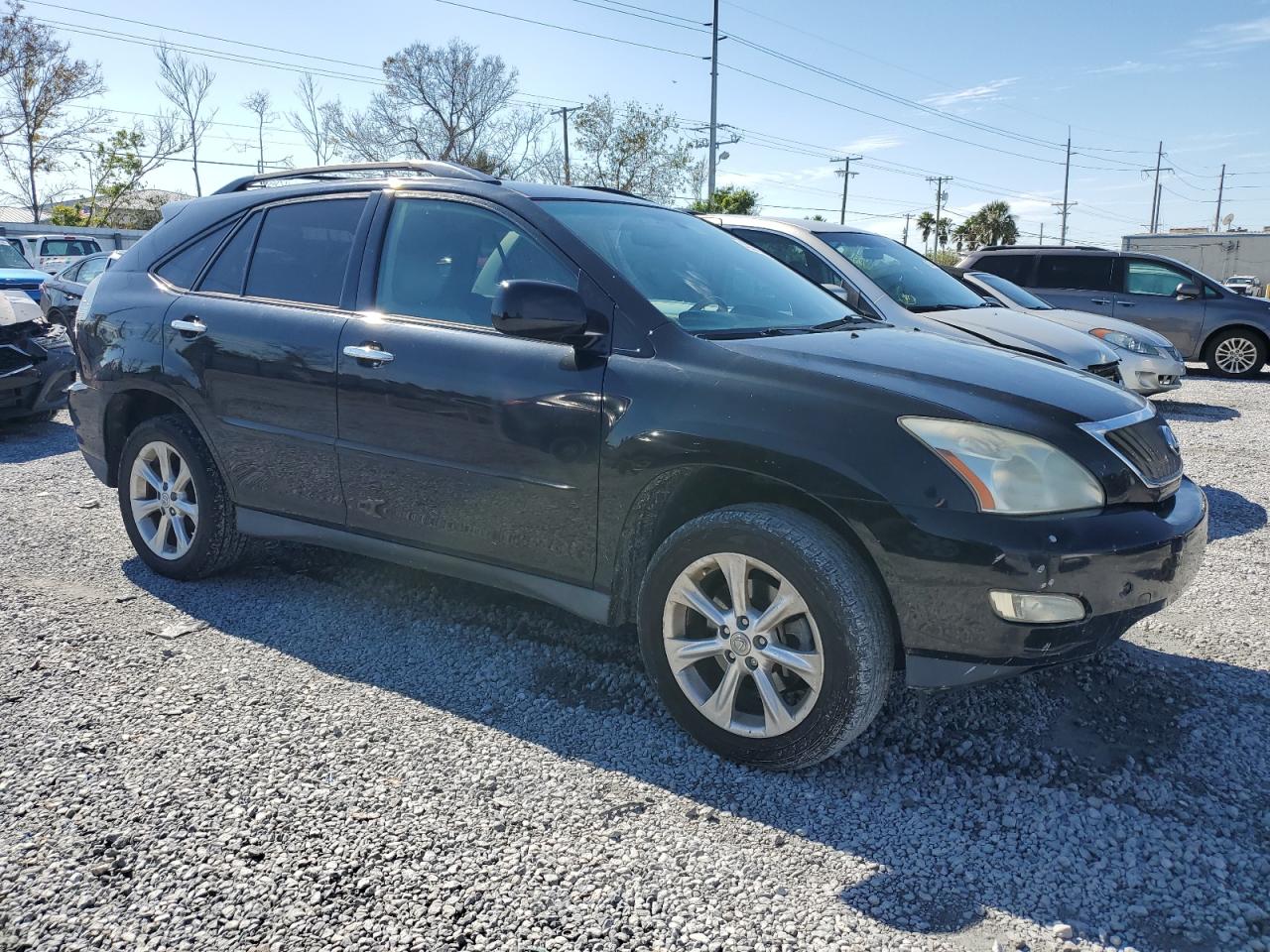 2009 Lexus RX VIN 2T2GK31U59C073441 Copart auction photo, minor dent/scratches damage thumbnail 4